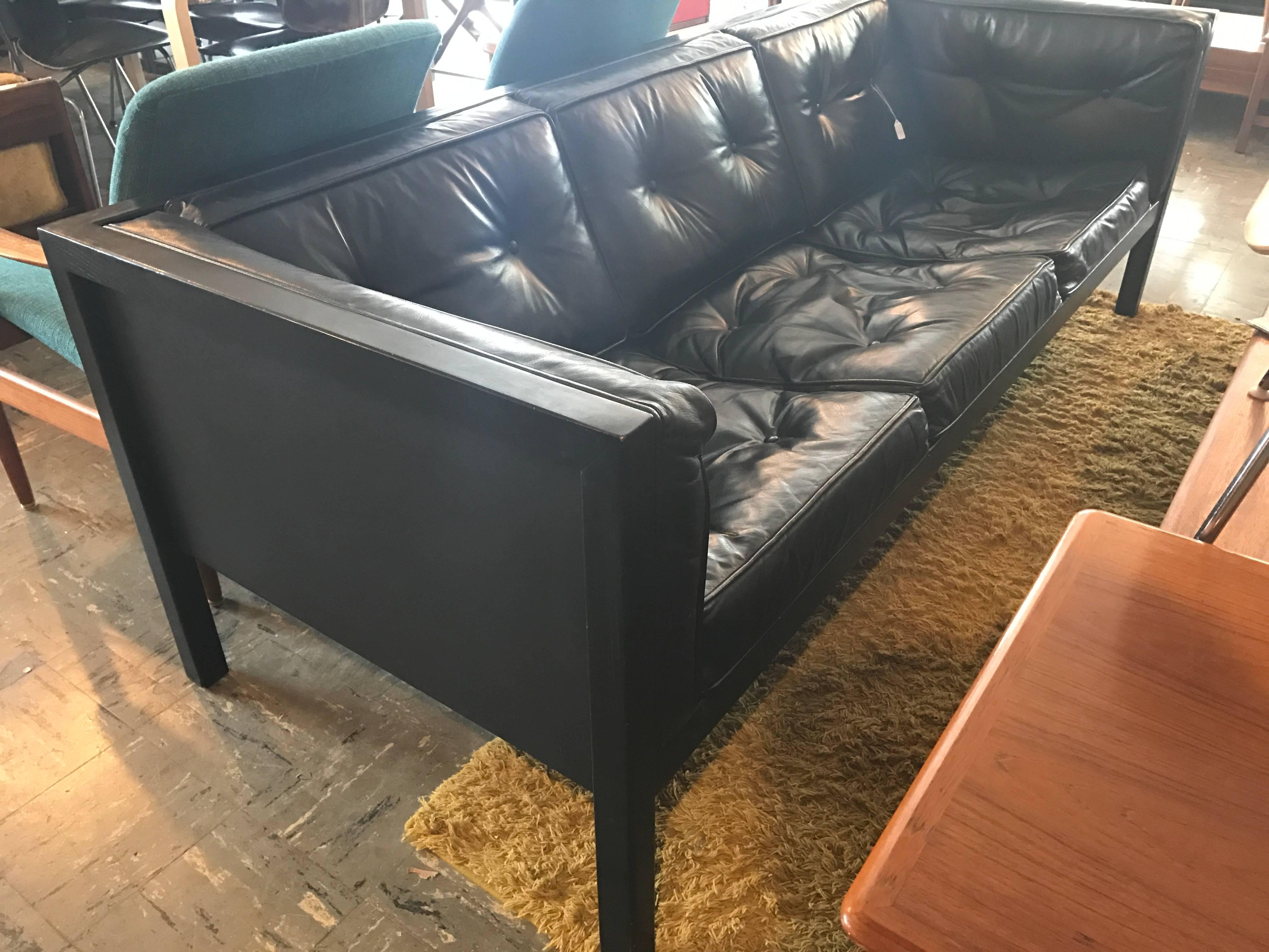 In incredible condition
all original cube group sofa by George Nelson
painted black oak frame with black leather cushions
avant garde Classic design.
  