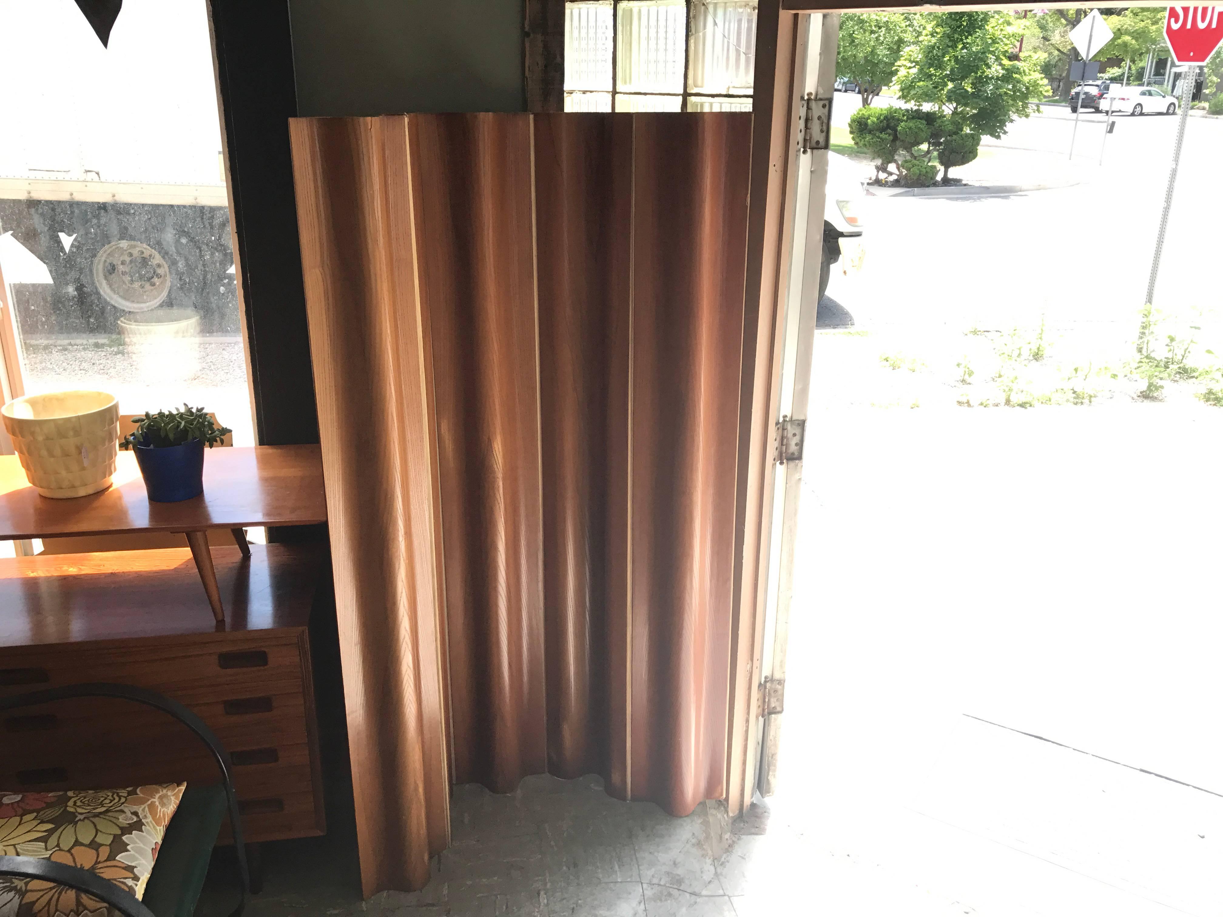 Sculpted plywood screen in great vintage condition 
wear from age and use.