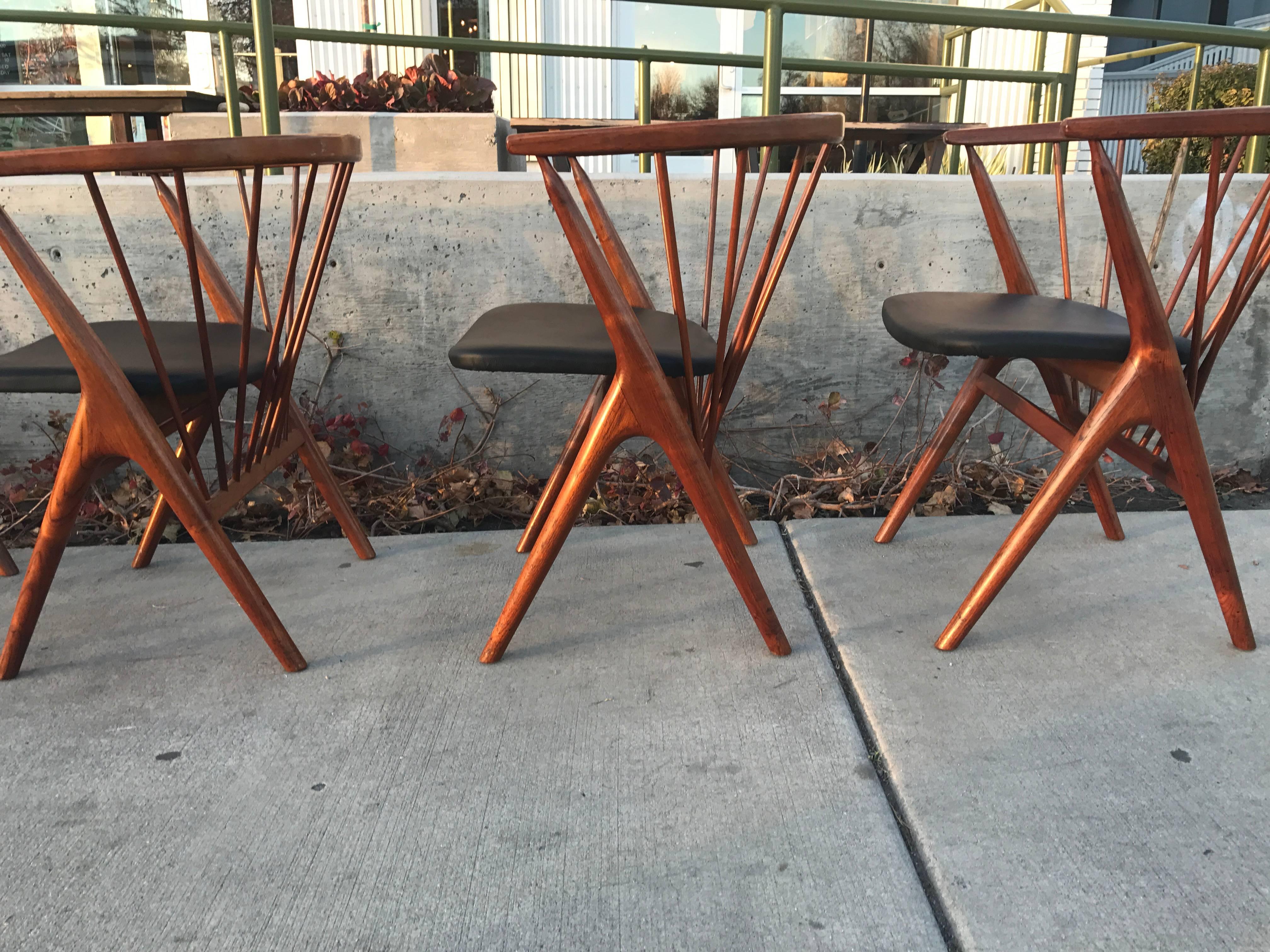 Gorgeous teak spindle back chairs by Helge Sibast
these are in great vintage condition
new leather and foam for seats
unique and classic design.
   