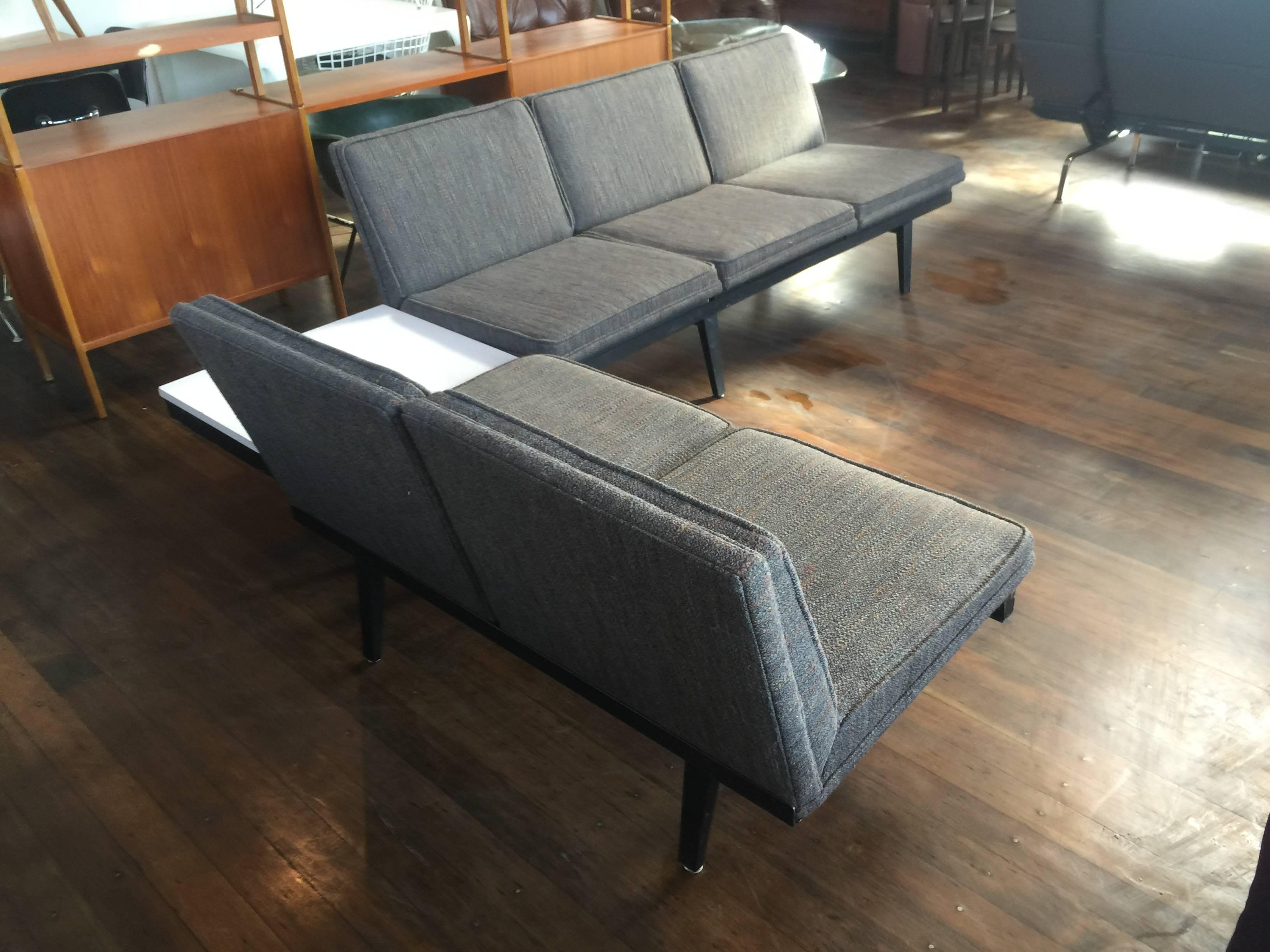 This is a gorgeous sectional that has just been reupholstered in Knoll Rivington textile.
This set includes, 
One steel frame which is 8ft long,
one steel frame which is 4ft long.
There are five seats and 
one laminate top table.
This can be