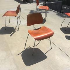 Set of Six Early Eames Aniline Red DCM Chairs