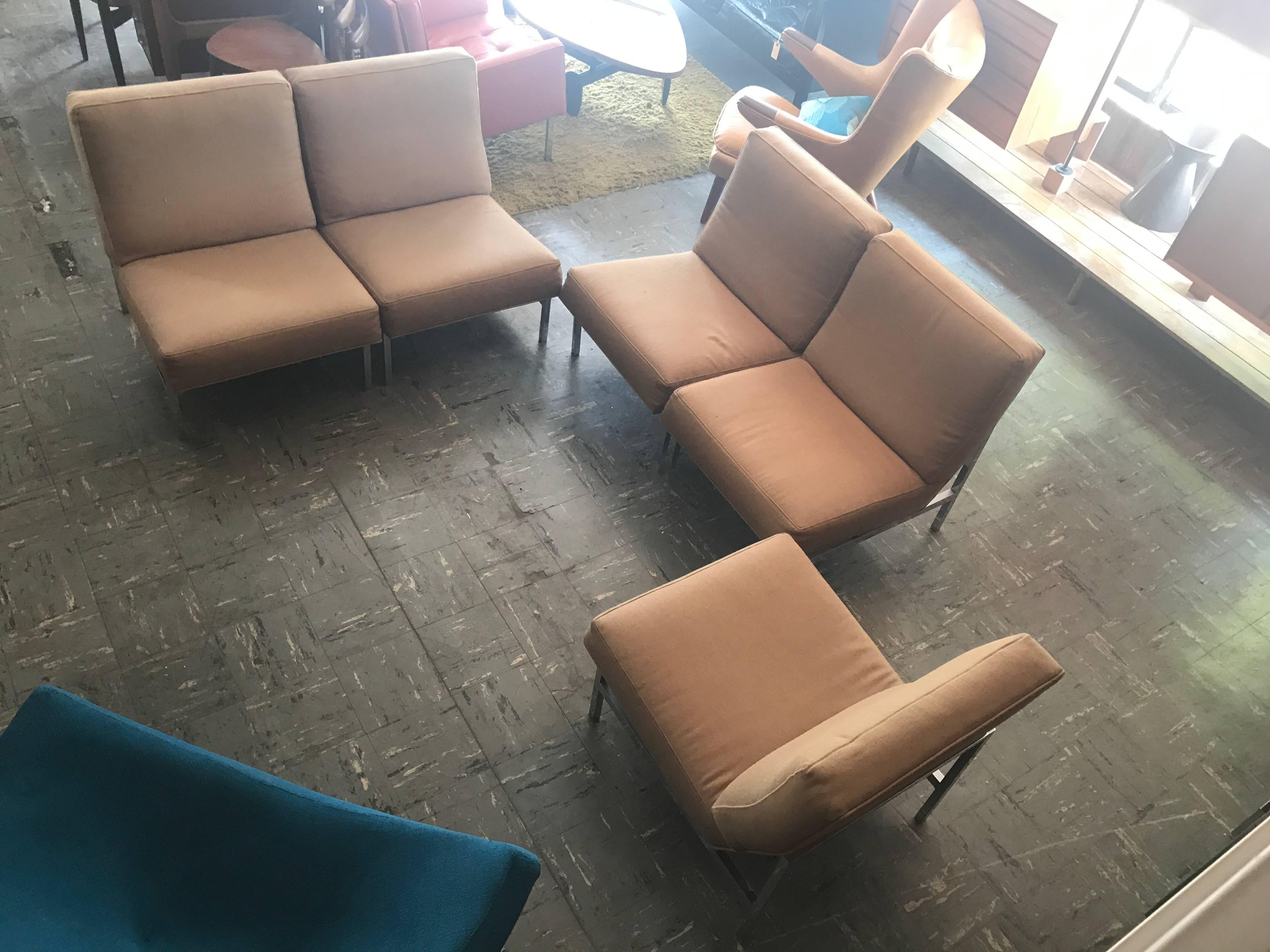 set of five ounge chairs designed by Florence Knoll 
these can be situated in many ways 
fabric is the original wool and is in great condition 
foam is also in great shape 
very comfortable 
chrome is also super clean.
 