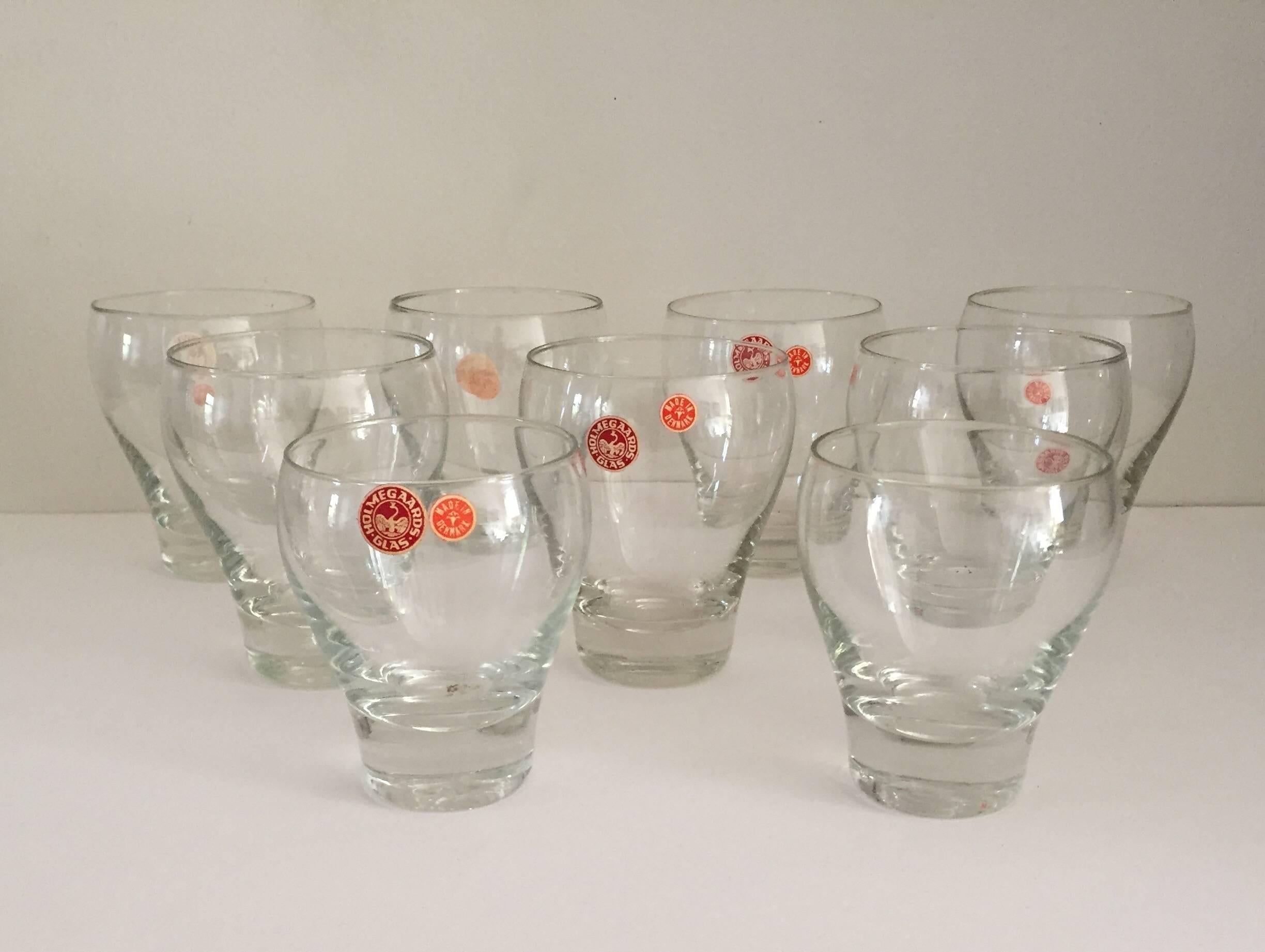Danish manufacturer Holmegaard is the number one manufacturer of handblown and molded glassware in Denmark. Designer Per Lütken (1916-1998) helped to put the firm on the map of great Mid-Century Modern Danish design, his clean lines marking a