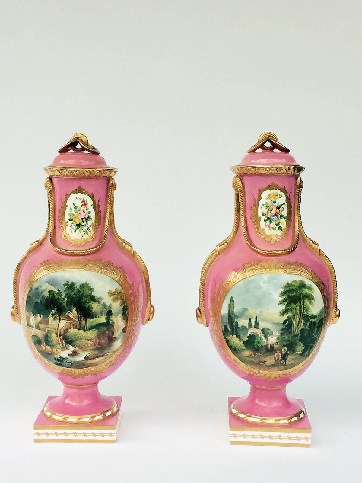 English Coalbrookdale porcelain pair of pink baluster-form vases, made and painted in the Sevres style, each vase molded with faux-bronze 