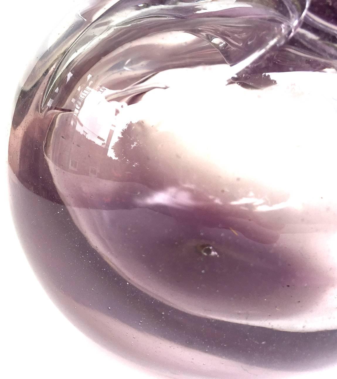 Stauffer Studio art glass free vase, signed by artist and maker Richard L. Stauffer. The globular vase with center hole, the amethyst color stretched and played with to the interior of the form. This type of experimental material is parallel to