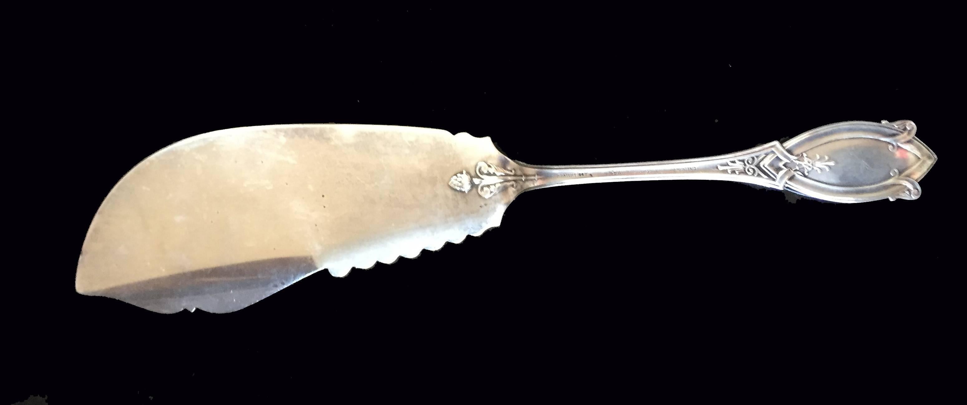 Victorian American Tiffany & Co. Sterling Silver Cake Slice, 1870s. The pattern is like a stylized version of Italianate, with bas-relief strawberry at the transition point where the server meets the handle. Engraved on the slice with Italianate