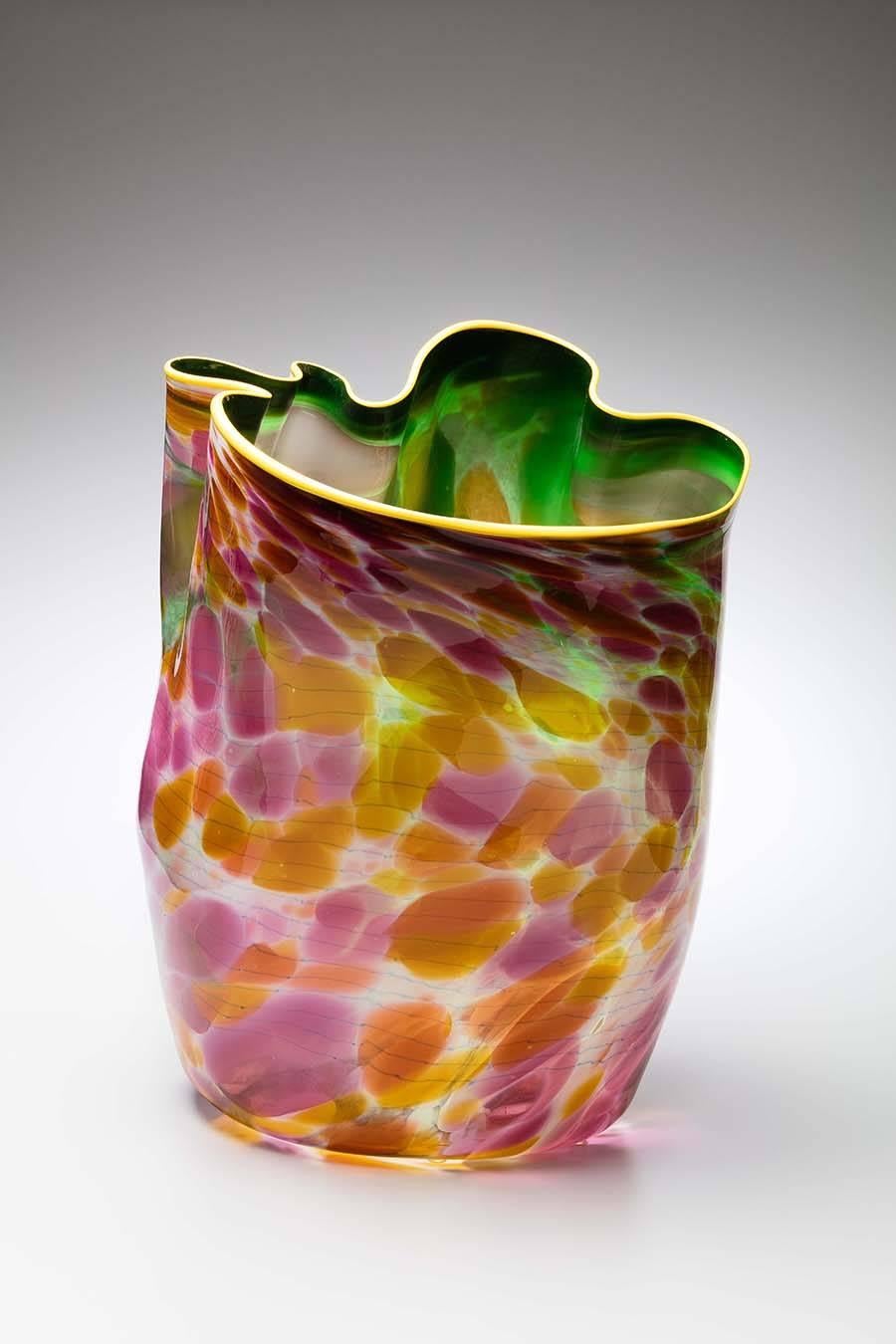 American Dale Chihuly (b. 1941) blown glass massive bowl basket, dated 1988.

This organic-form bowl basket is of a desirable early date, and includes an incredible array of vivid colors. The interior appears to be a vivid emerald green under