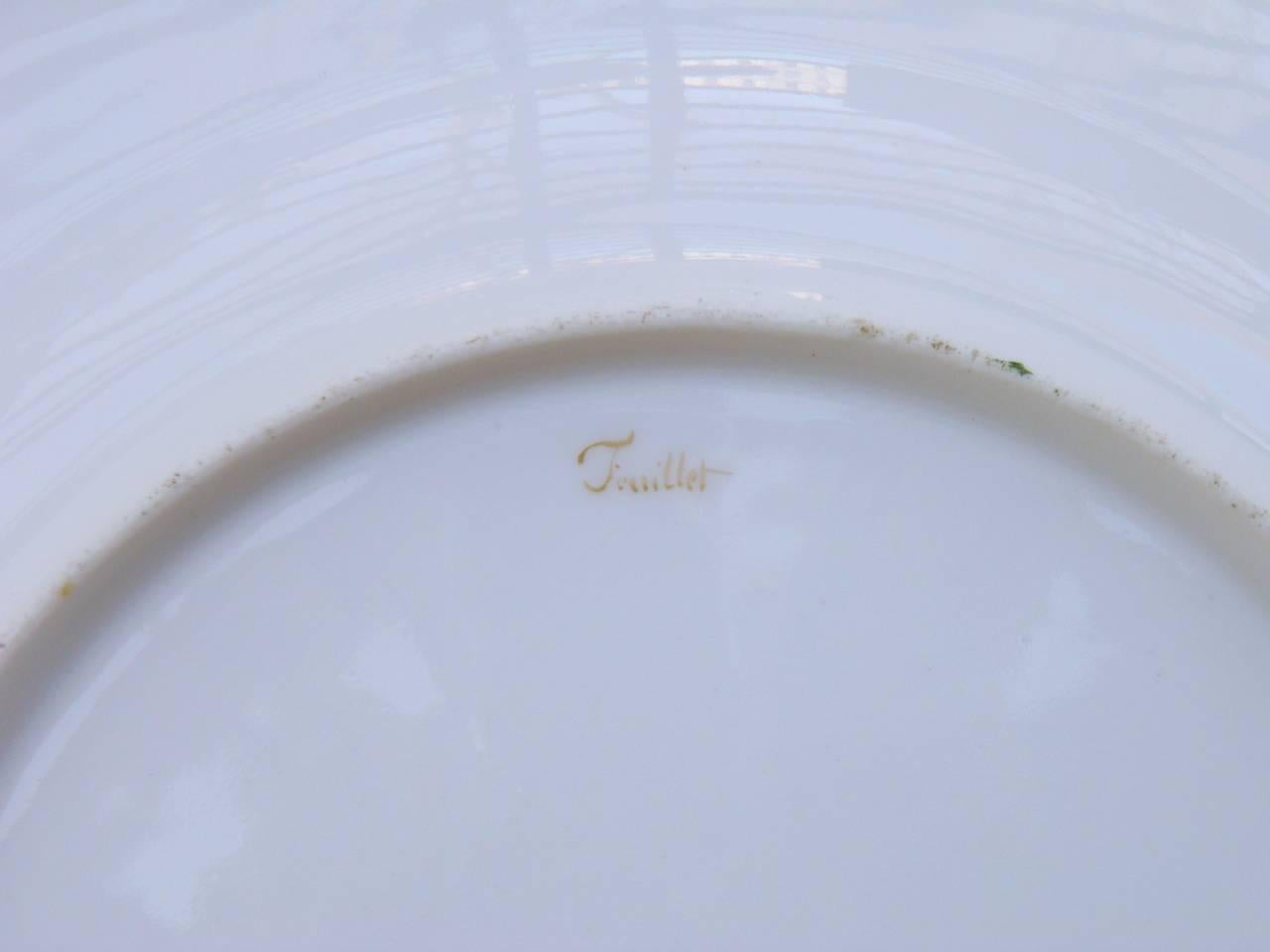 Set of 12 Old Paris Feuillet porcelain green-ground dessert plates.

French ‘Vieux Paris’ Feuillet porcelain green ground. Dessert plates, set of twelve, with scallop-moulded borders. Each painted with a variant bouquet. Signed,

circa