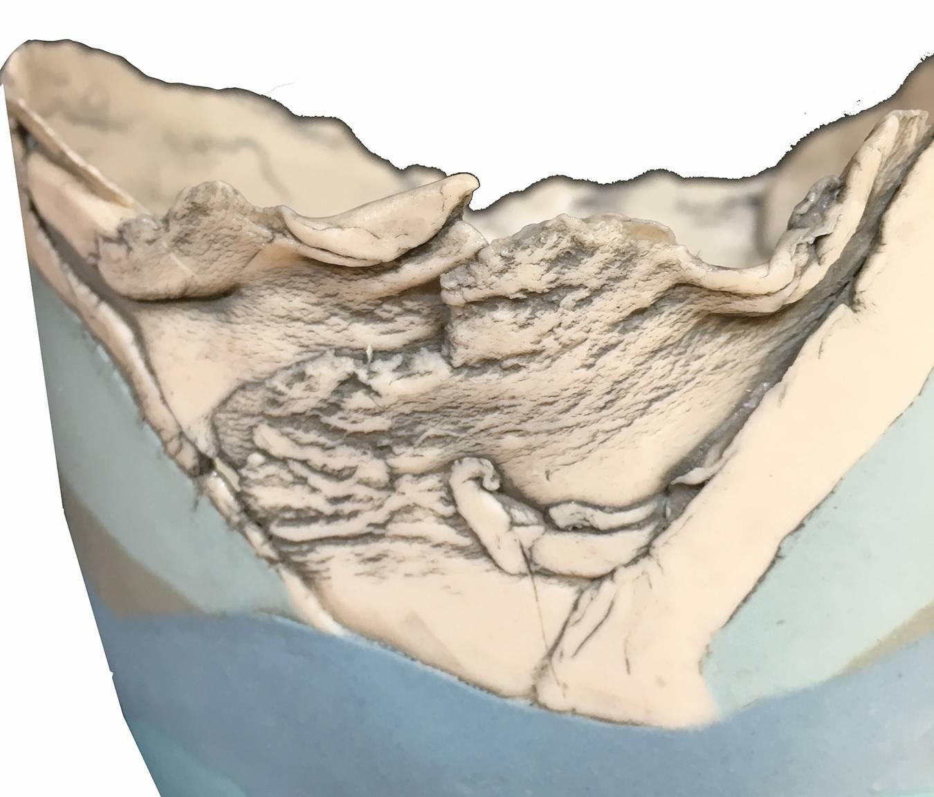 British studio pottery mary white blue, lavender, grey and white vase vessel, of ovate form, the lower section glazed in lilac purple, turquoise, natural white and grey tones, in patches and irregular bands. The area toward the top with an