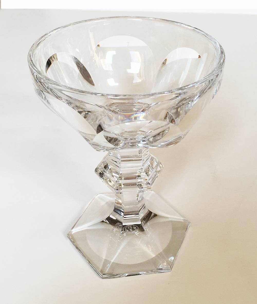 French Baccarat crystal Harcourt pattern vintage wine glasses, set of 12.

French crystal Baccarat Harcourt wine glasses, group of 12,

the cut-glass panelled bowls above knuckled stems, above hexagonal-sided bases. Each marked to the underside.