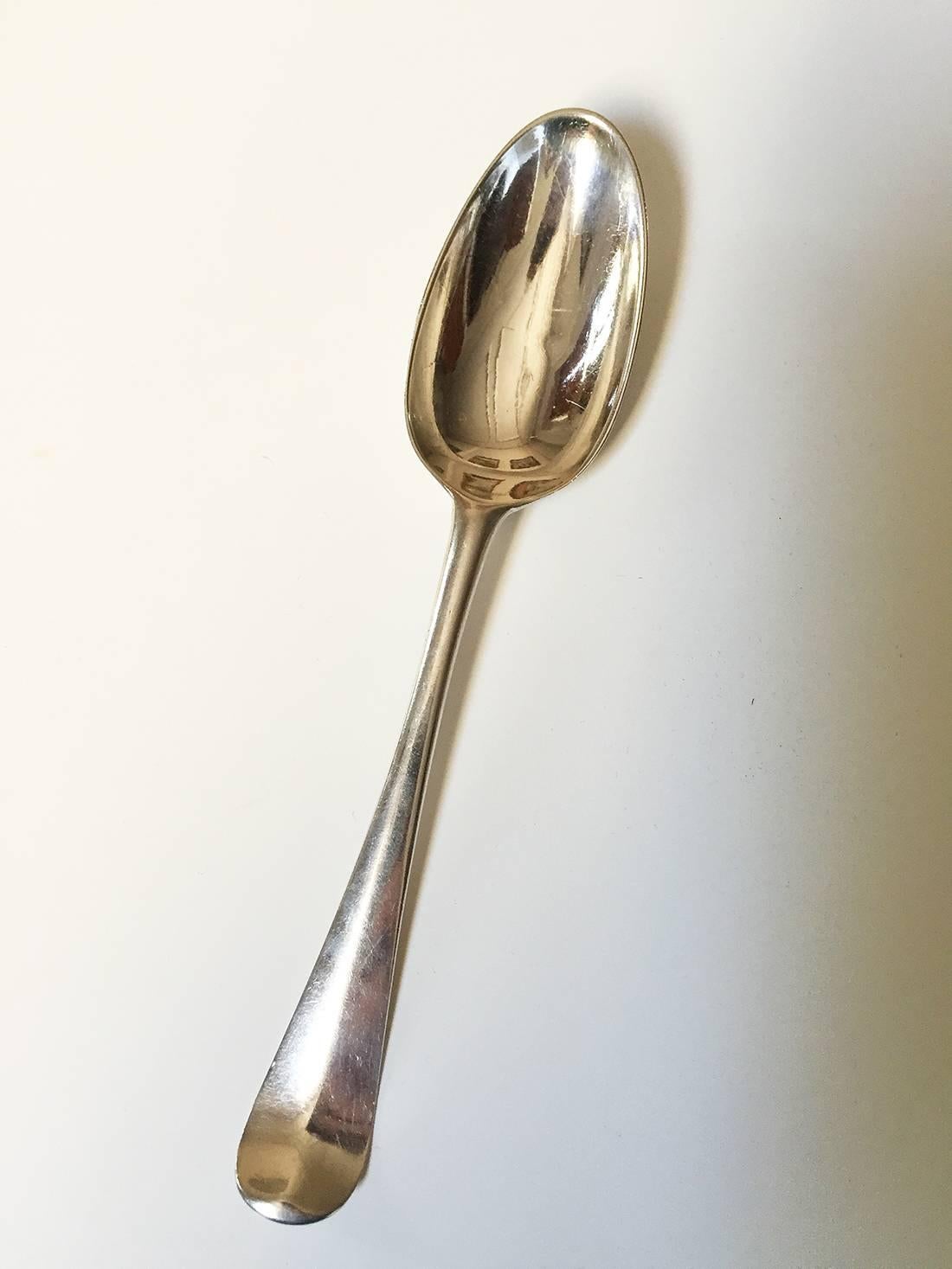 English George I set of ten Britannia silver spoons, with the maker's mark of London silversmith Isaac Davenport, 1719, London 1719; a Britannia silver spoon made in 1720 (indistinct mark) and a Britannia silver spoon of similar period with