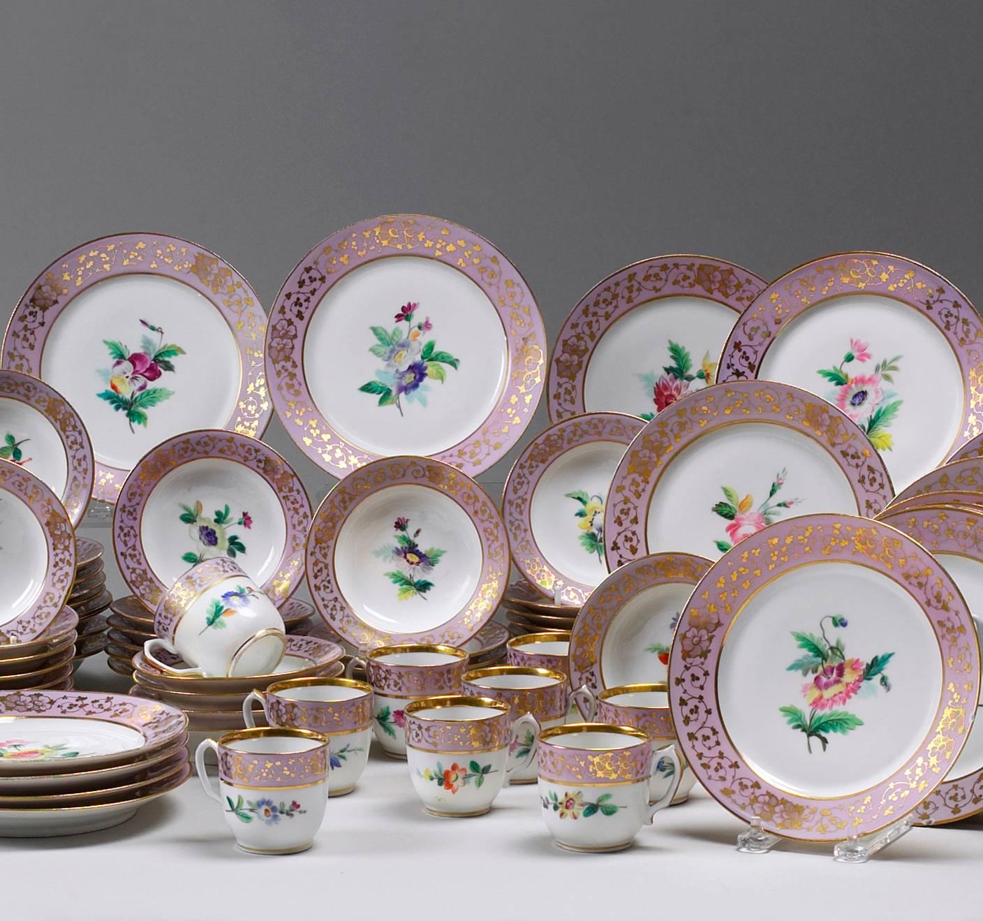 15 dinner plates, 9 inches diameter, with floral painting.
12 dessert plates, 8 1/4 inches diameter, with floral painting.
Eight soup plates, - 9 3/4 inches diameter, with floral painting.
12 dessert plates painted with fruit.
Nine coffee cups,