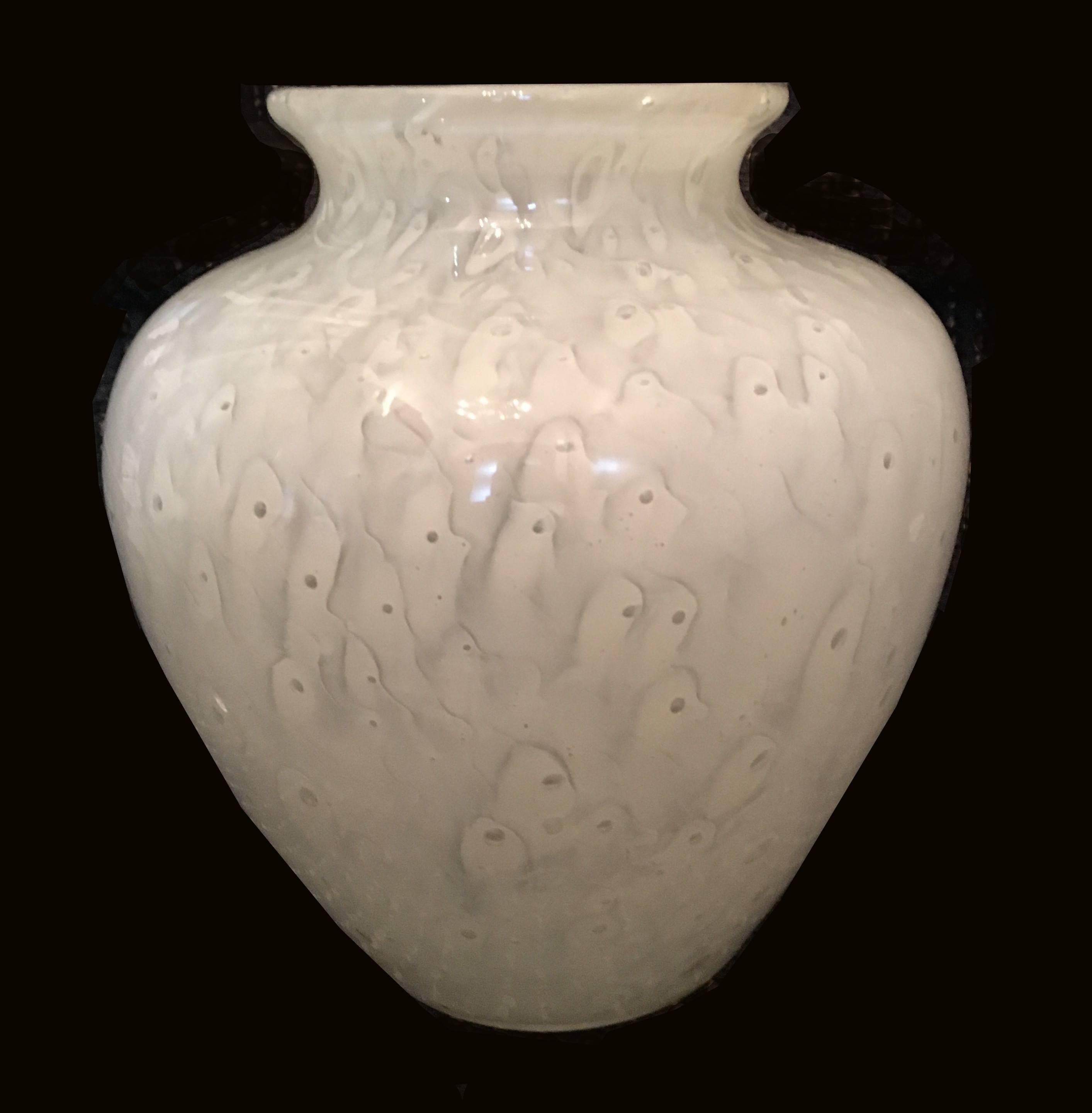 American Steuben white Cluthra glass vase, circa 1920 the vase the flared rim over short neck over a swelling shoulder, tapering toward the foot, with polished pontil. 

Unmarked.

Measures: 8