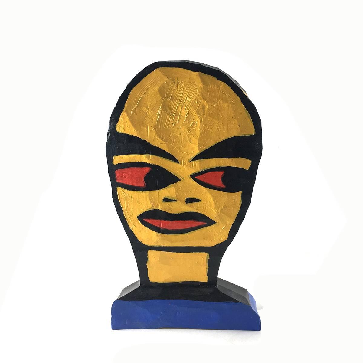 Tom Cramer contemporary art wood sculpture superhero TOTEM mask

Carved of white pine. The sculpture is a stylized head, painted in bright primary colors red, yellow and blue, with black outlines.

Signed T.C. '97 and Tom Cramer '97 and with