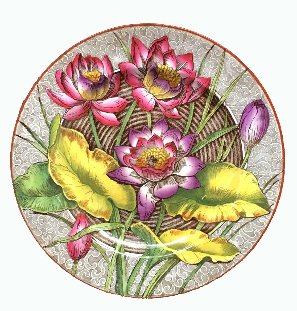 English Wedgwood Aesthetic Movement dinner plates in water lily pattern, available as a group of five plates in the same transfer-printed pattern, of a circular basket of concentric brown bands under a brocaded border, all featuring Water Lilies aka