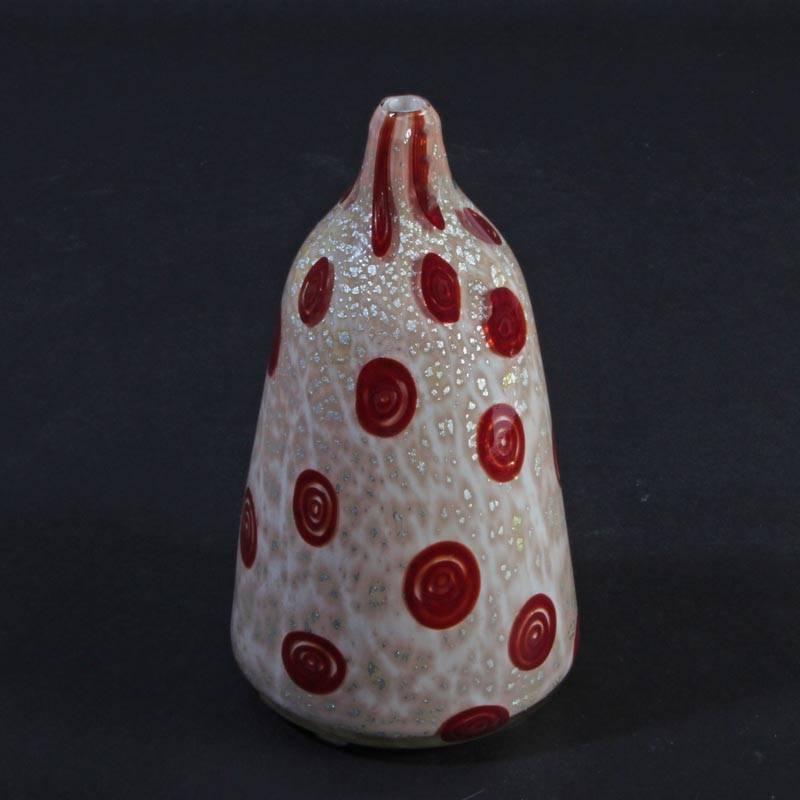 Handblown Latino glass vase with red murine and silver foil designed by Giulio Radi for A.V.E.M., Murano Italy, 1940’s. He experimented with thickly layered glass, murrine, and metallic inclusions. In 1932 he established the A.ve.M. glassworks and