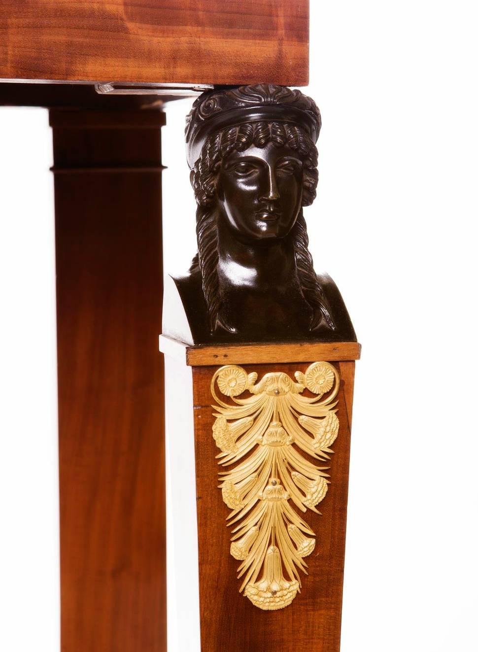 A fine and rare Empire mahogany console with gilt bronze mounts and a Belgium black marble top. Signed Chapuis, pieces of furniture signed by Jean-Joseph Chapuis, are rarely found in public collections outside of France. He was a French ebeniste or
