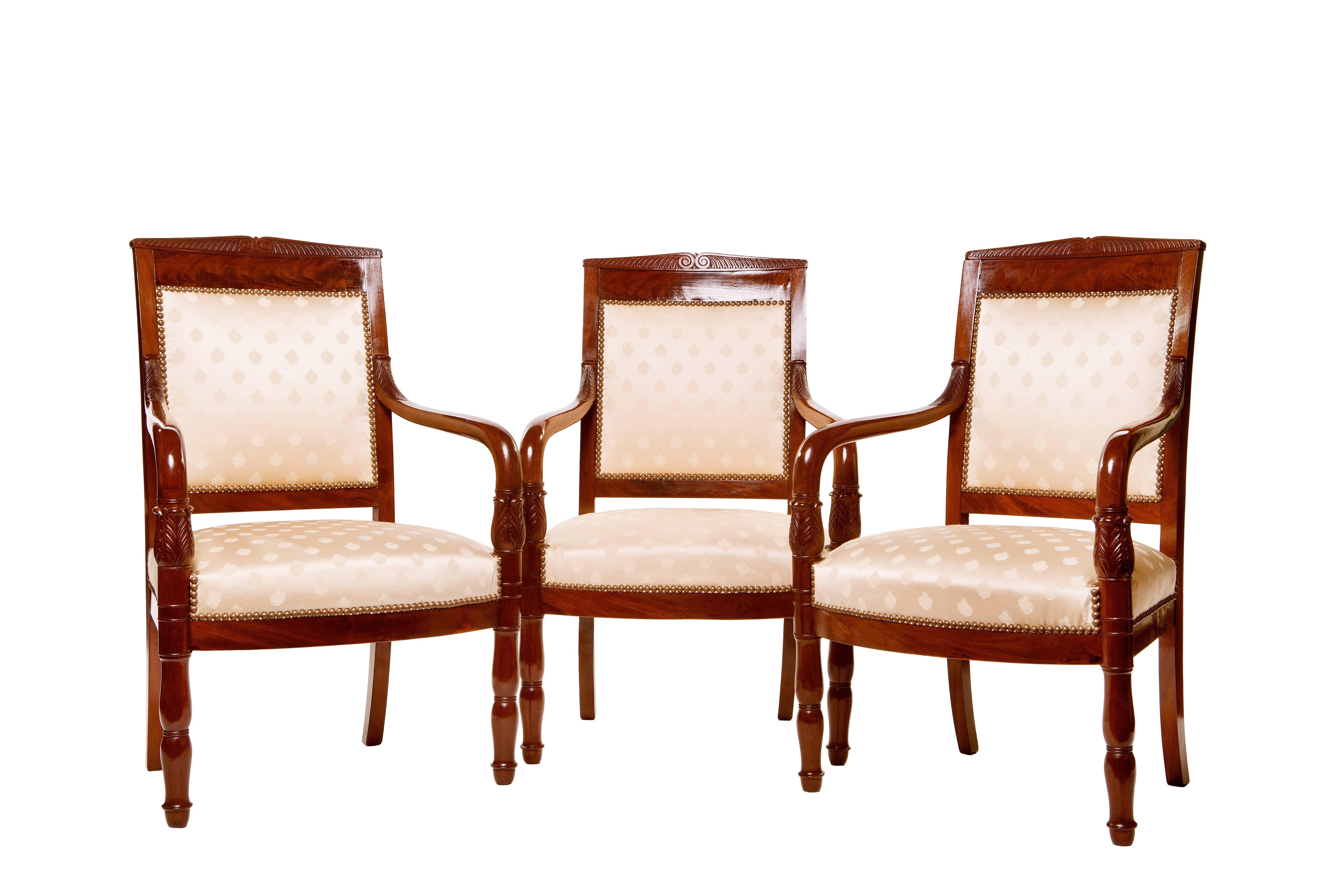 Comprising of a Settee, pair of Bergères and six Fauteuils à La Reine, each with an arched top rail above upholstered backrest, the down-swept armrests raised on acanthus craved supports, above the boy-fronted seat, raised in double