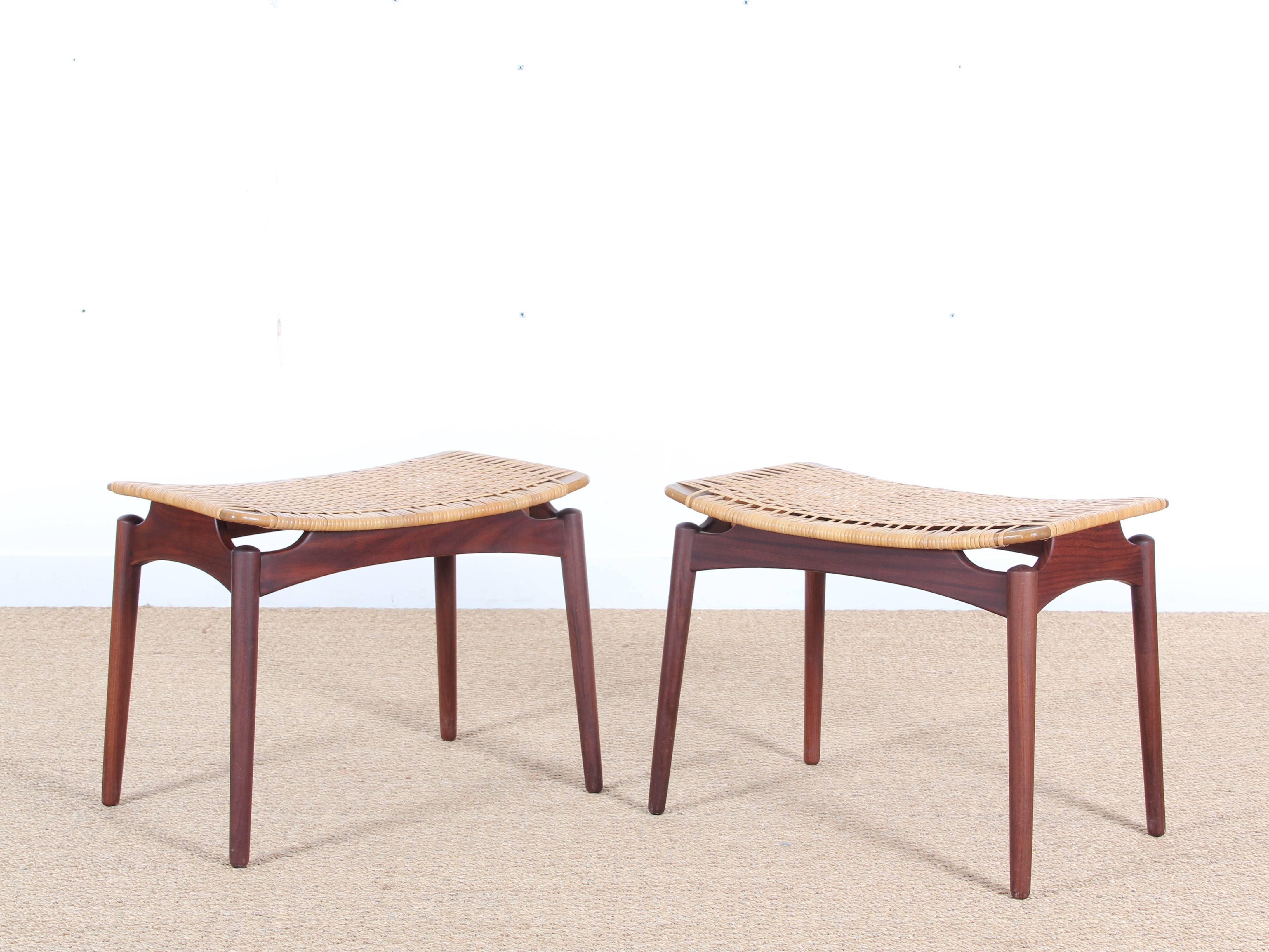 Mid-Century Modern Danish pair of teak and cane stools.