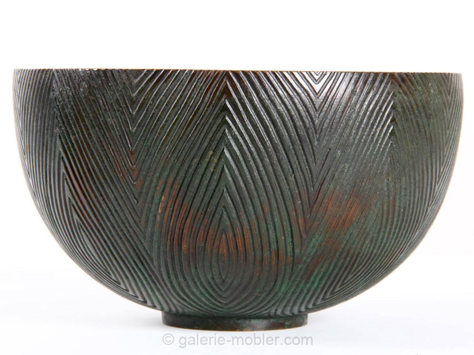 Bronze bowl with fluted patterns Axel Salto. Produced in 40 years.