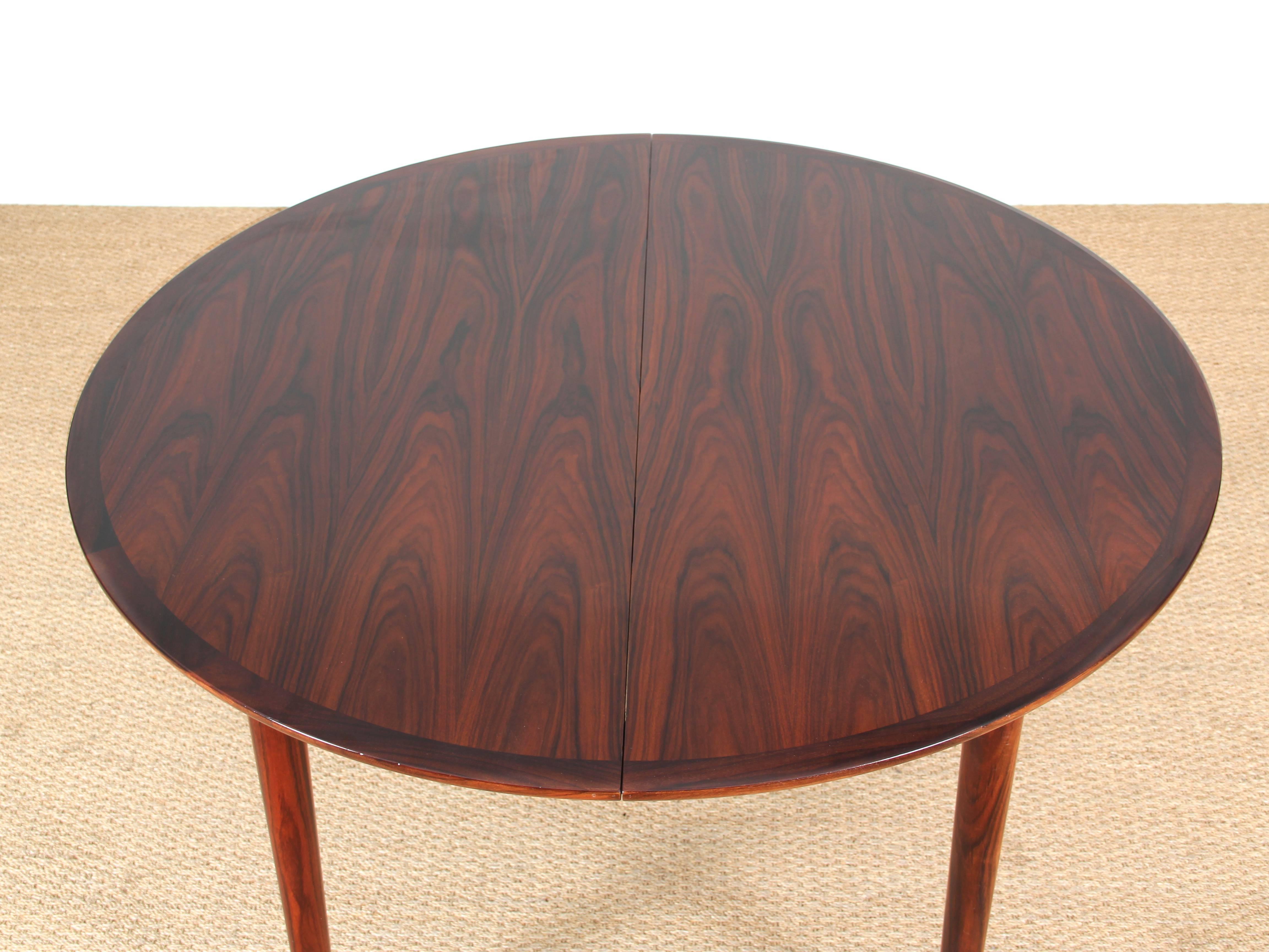 scandinavian round extendable dining table