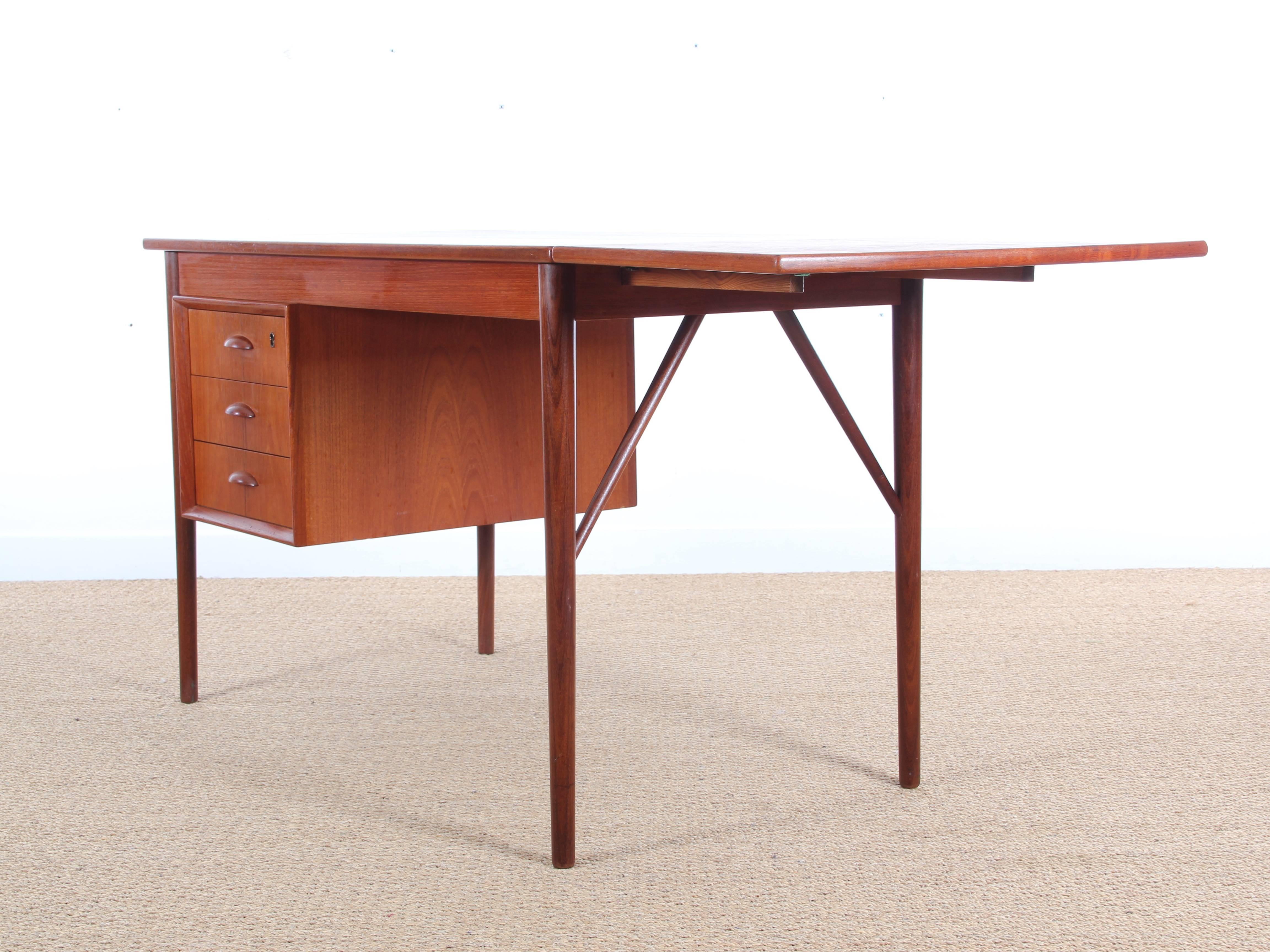 Mid-Century Modern writing desk in teak, in Arne Vodder style. Three drawers and extension leaf.