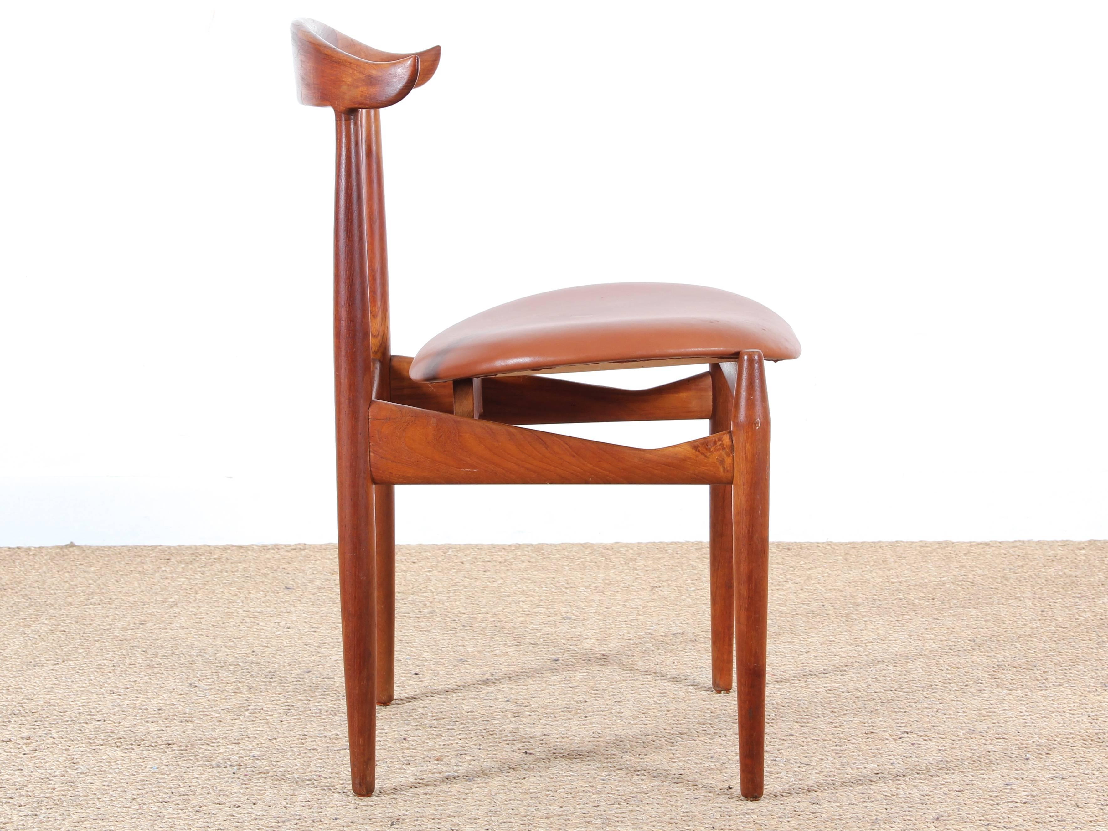 Rare Danish teak chair of Knud Faerch Slagelse Møbelvaerk. Seated redone and covered with full grain leather untreated.