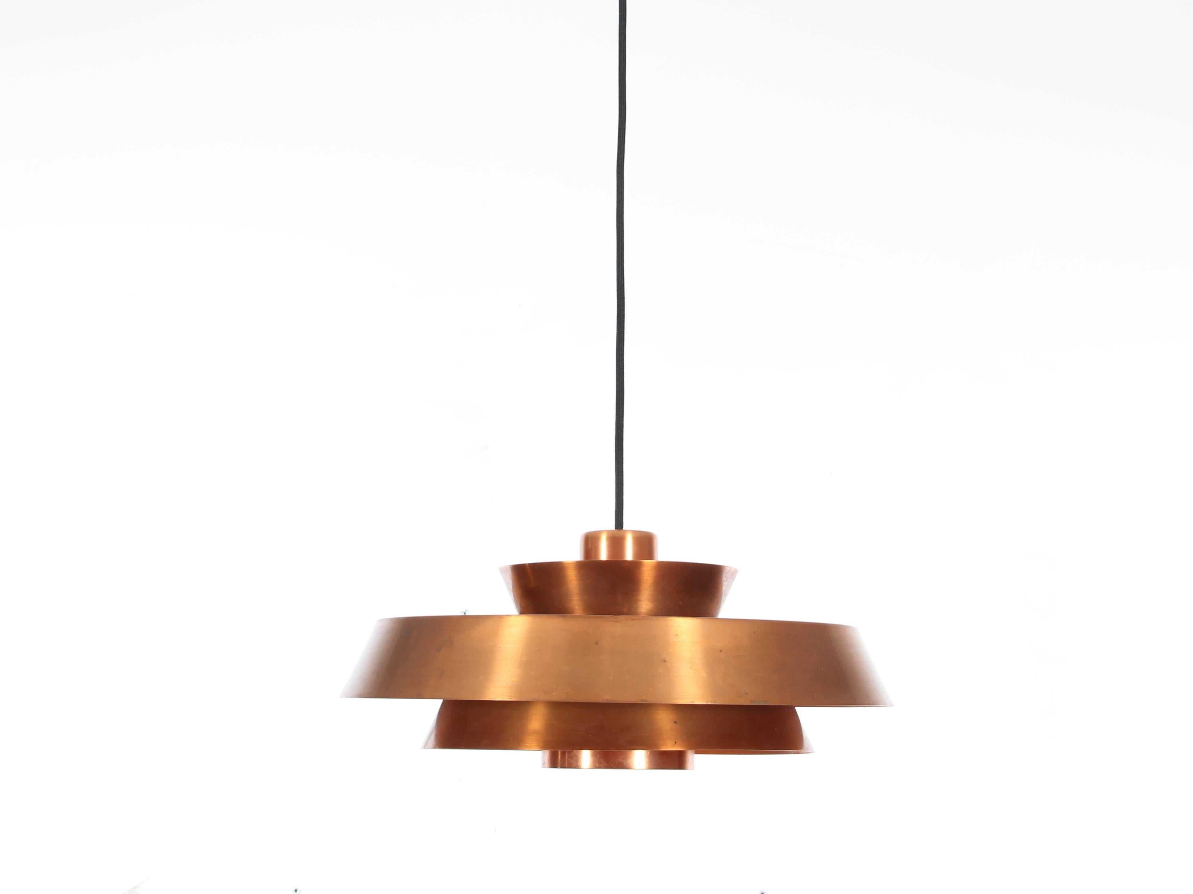 Mid-Century Danish pendant light in copper model Nova by Jo Hammerborg. New electrical system with black textile cable brought up to EU standard. E27 bulb.