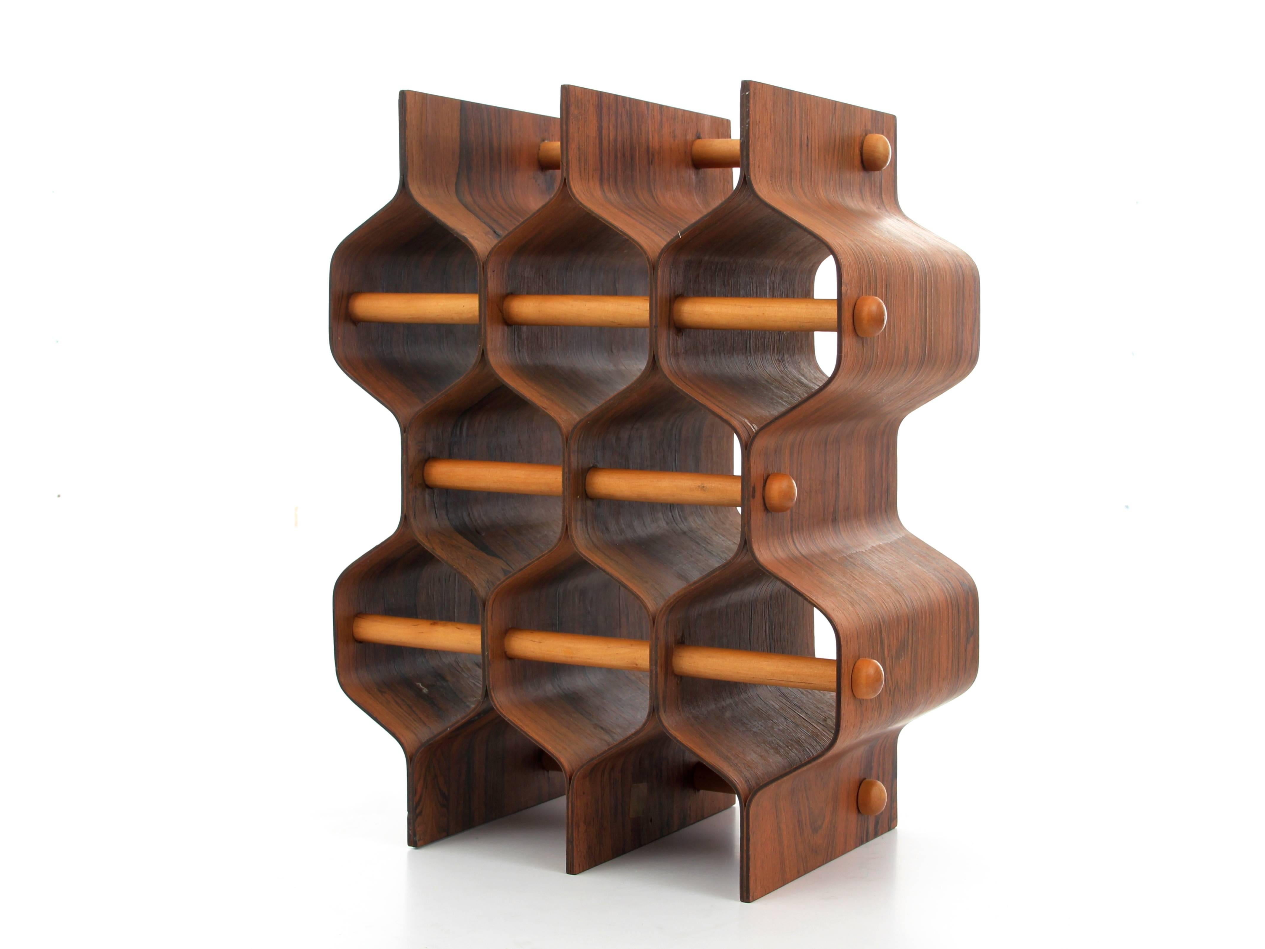 Mid-Century Modern wine rack by Torsten Johansson in Rio rosewood.