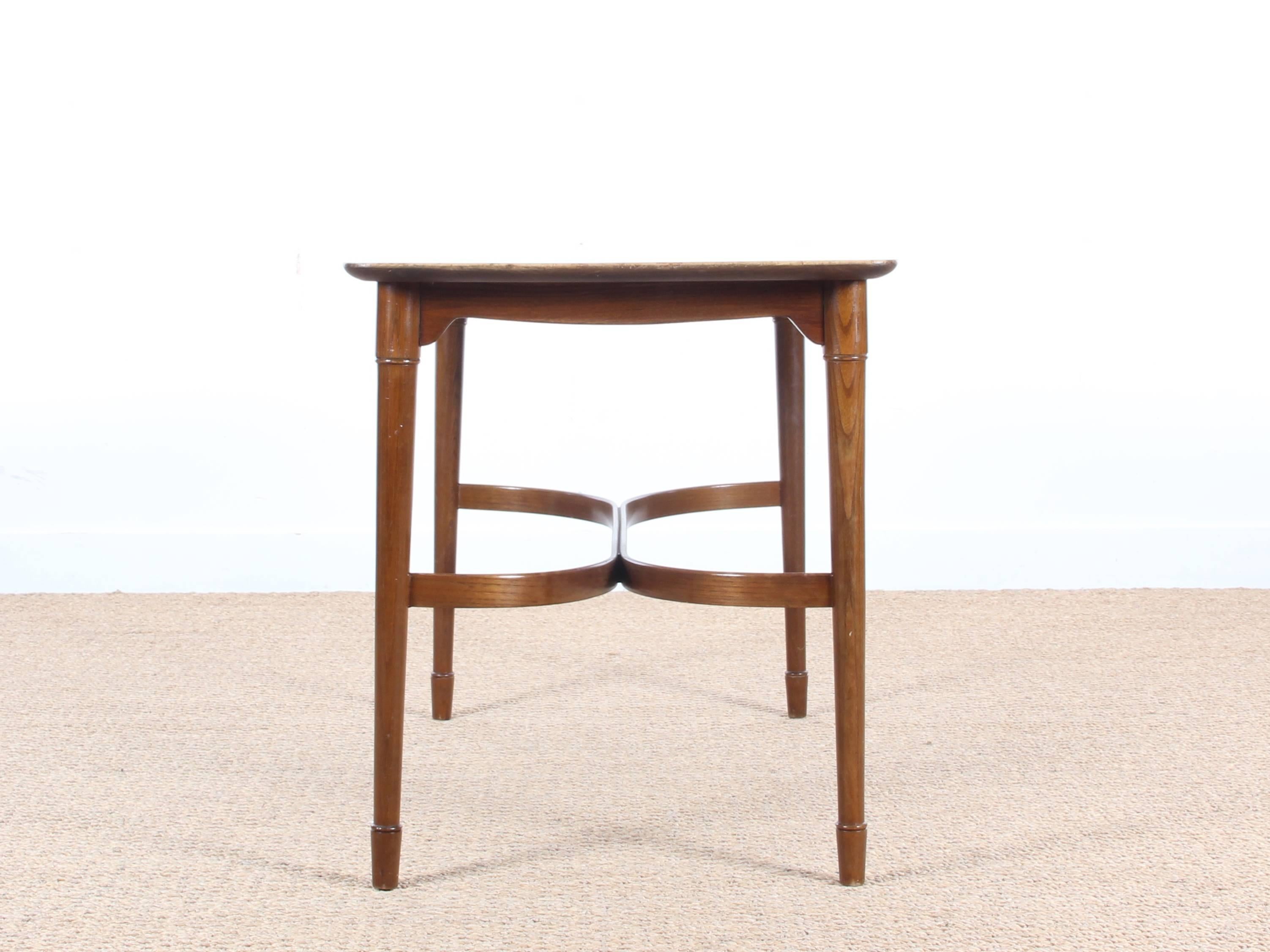 Mid-Century Modern coffee table in in walnut and mahogany. Danish cabinet maker work.