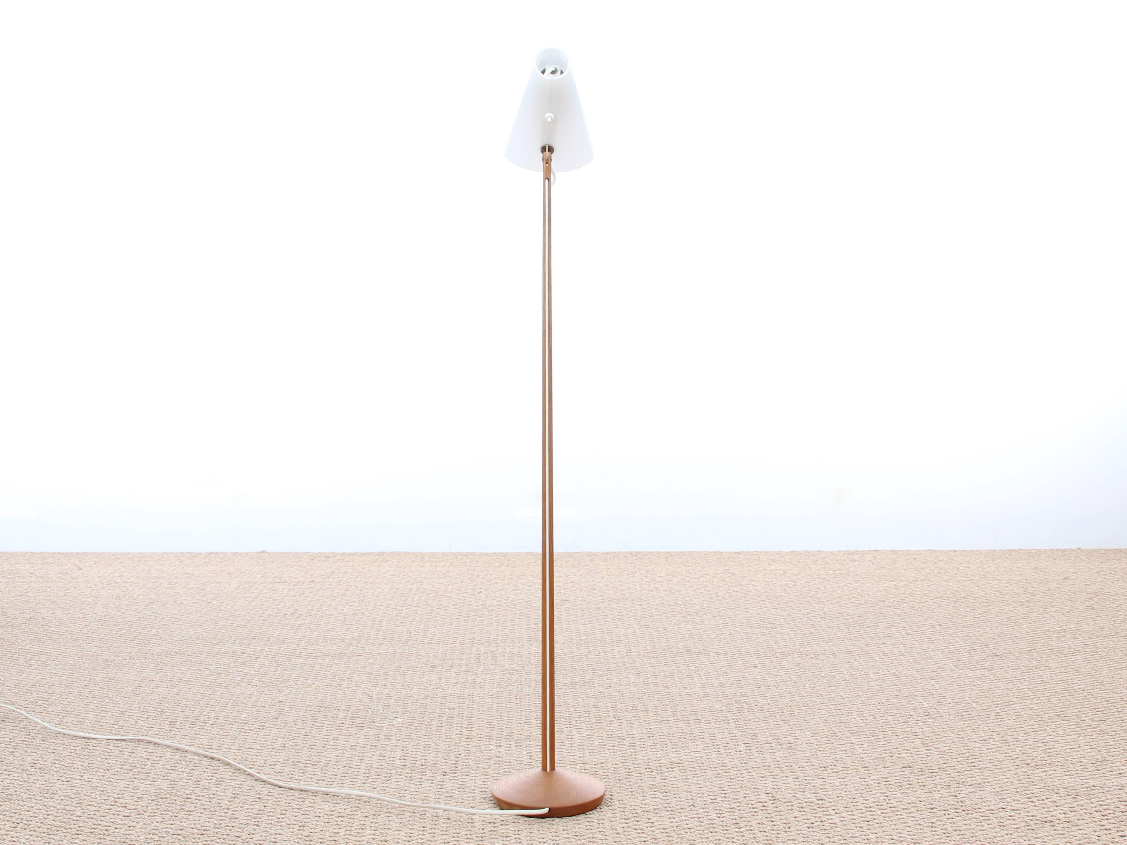 Mid-Century Modern small floor lamp by Uno & Osten Kristiansson for Luxus. Oak and acrylic orientable shade.
