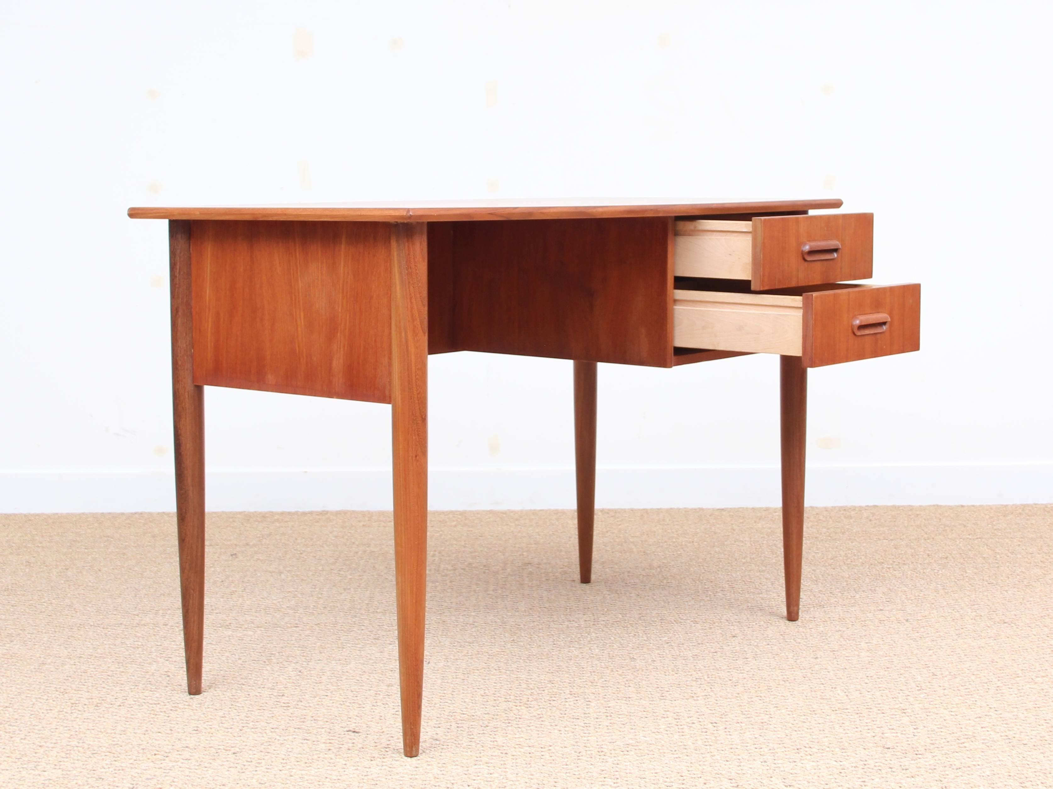 Mid-Century Modern small standing desk in teak with two drawers.