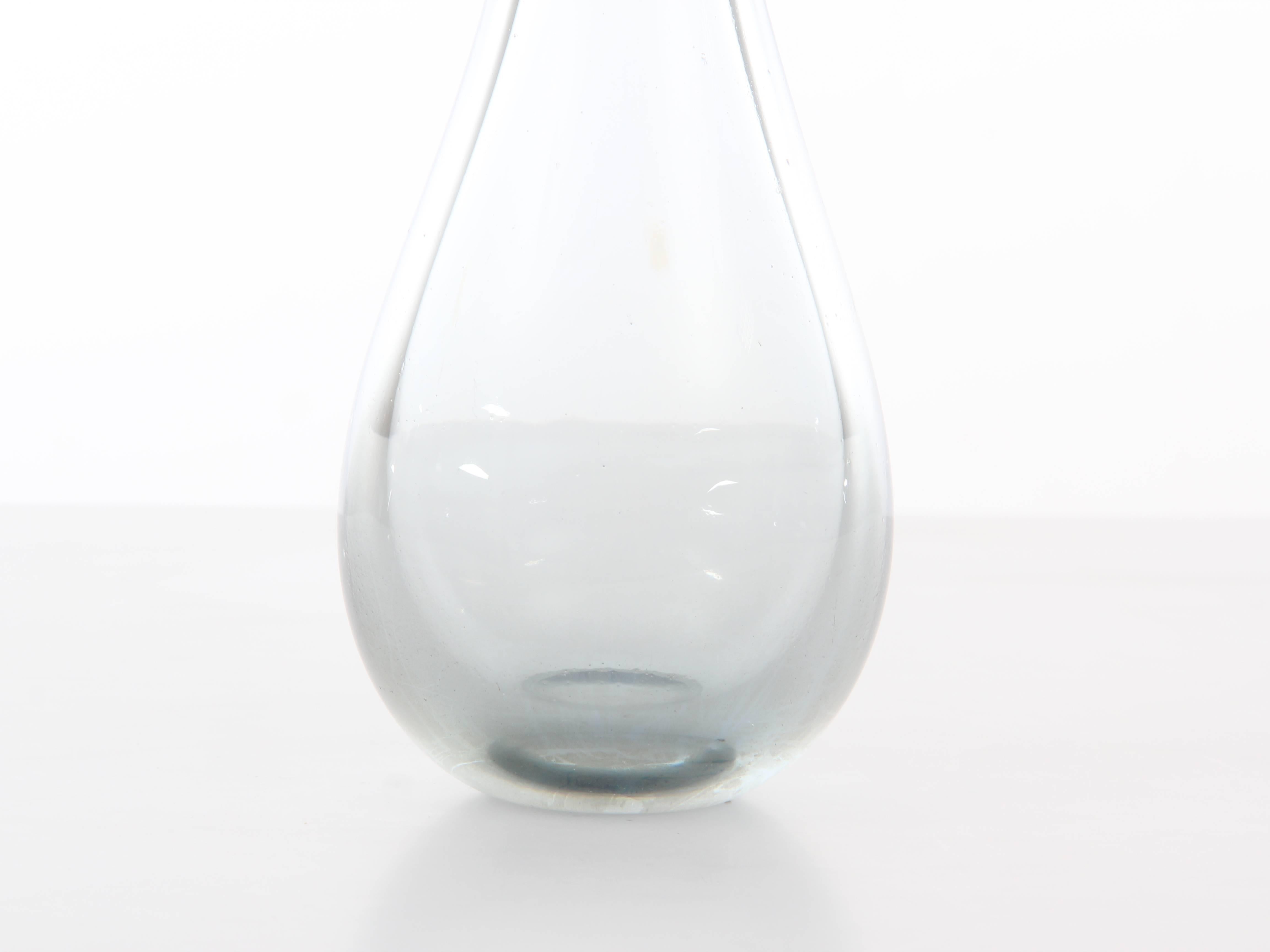 Mid-Century Modern Scandinavian vase in glass by Per Lütken for Holmegaard Glasværk. Wear consistent with age and use.