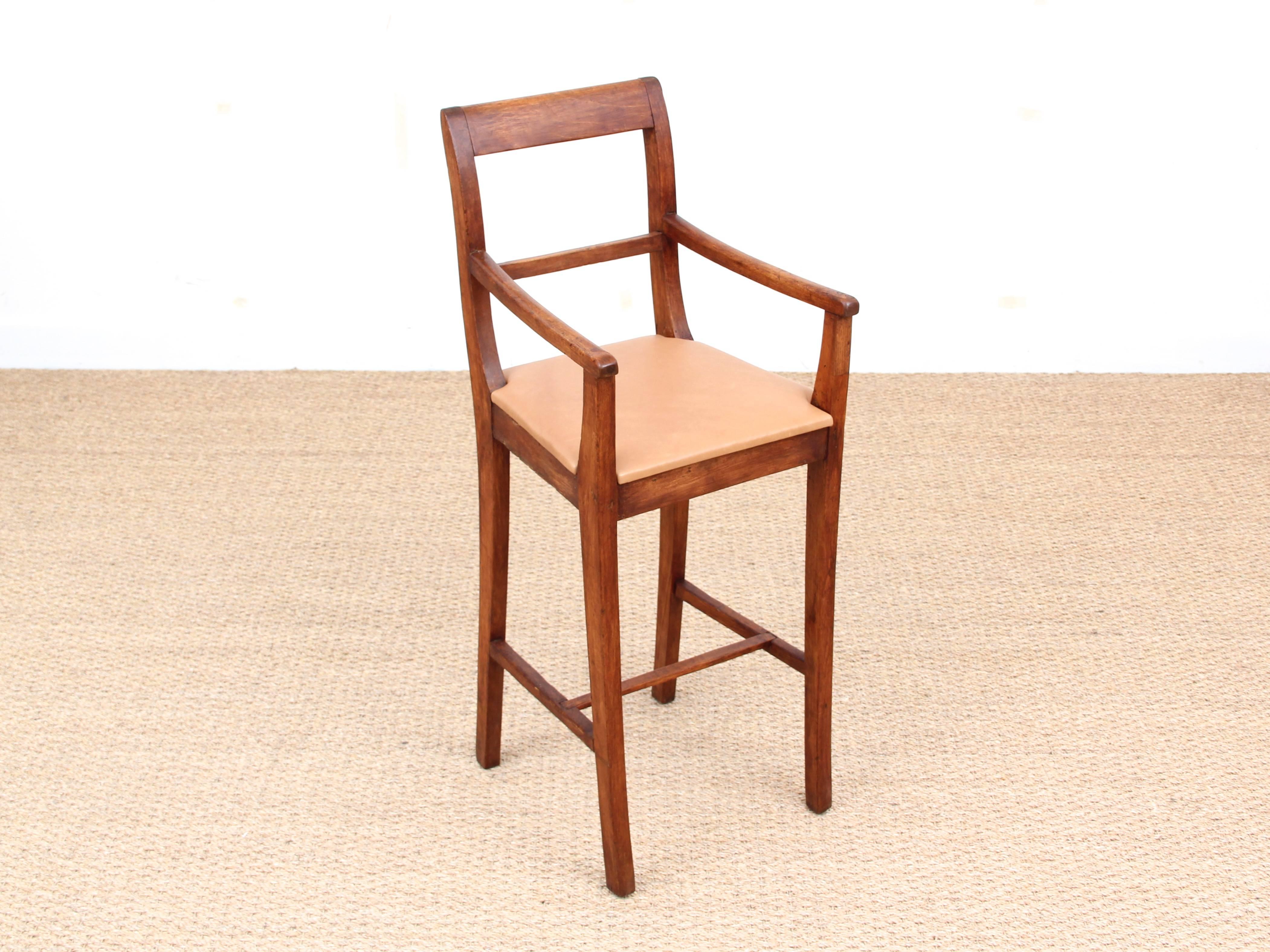 Swedish child hight chair from the 1900s, in stainend beech. Seat newly reupholtered with full grain leather. Ideal for children from 2 to 5 yo.