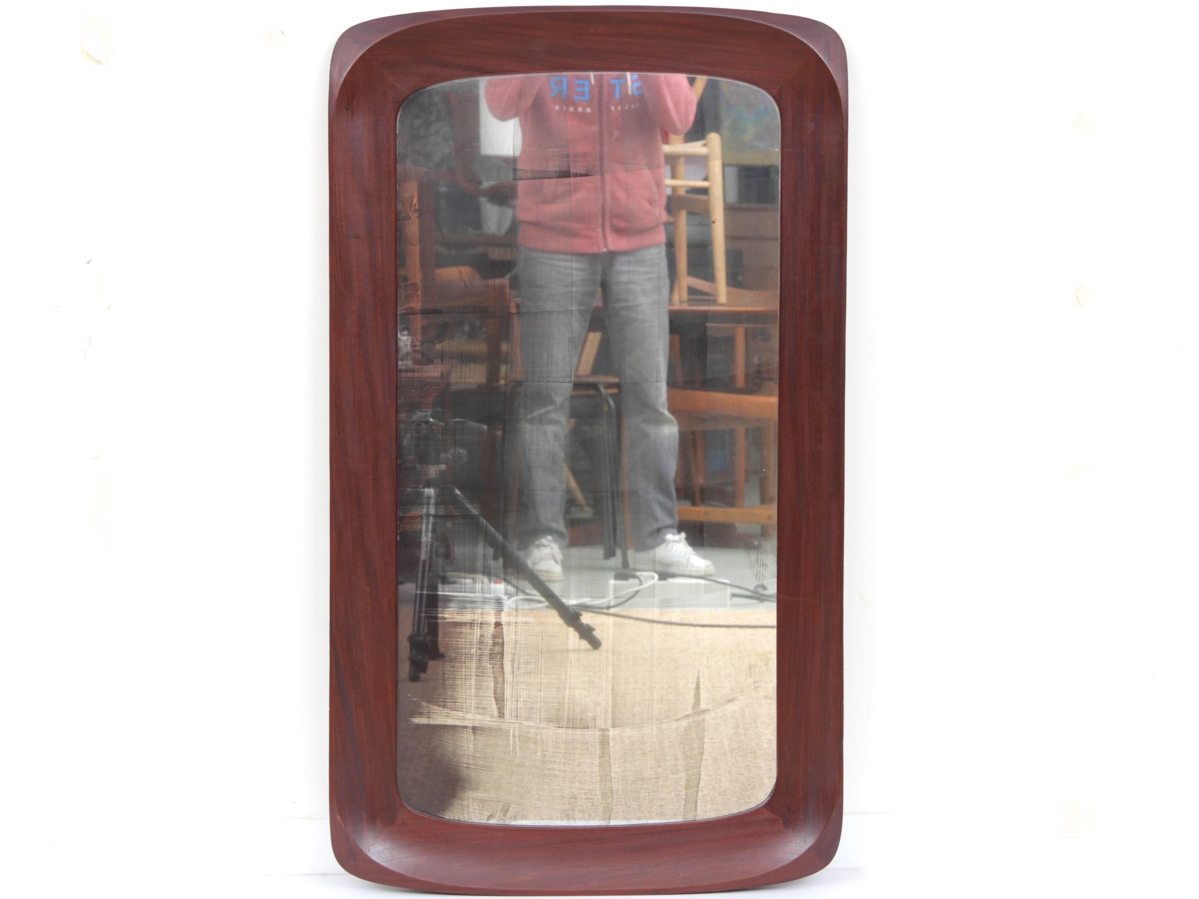 Mid-Century  modern scandinavian mirror in teak. Tain of mirror is alterated. Can be canged on demand with extra cost. Please contact us.
