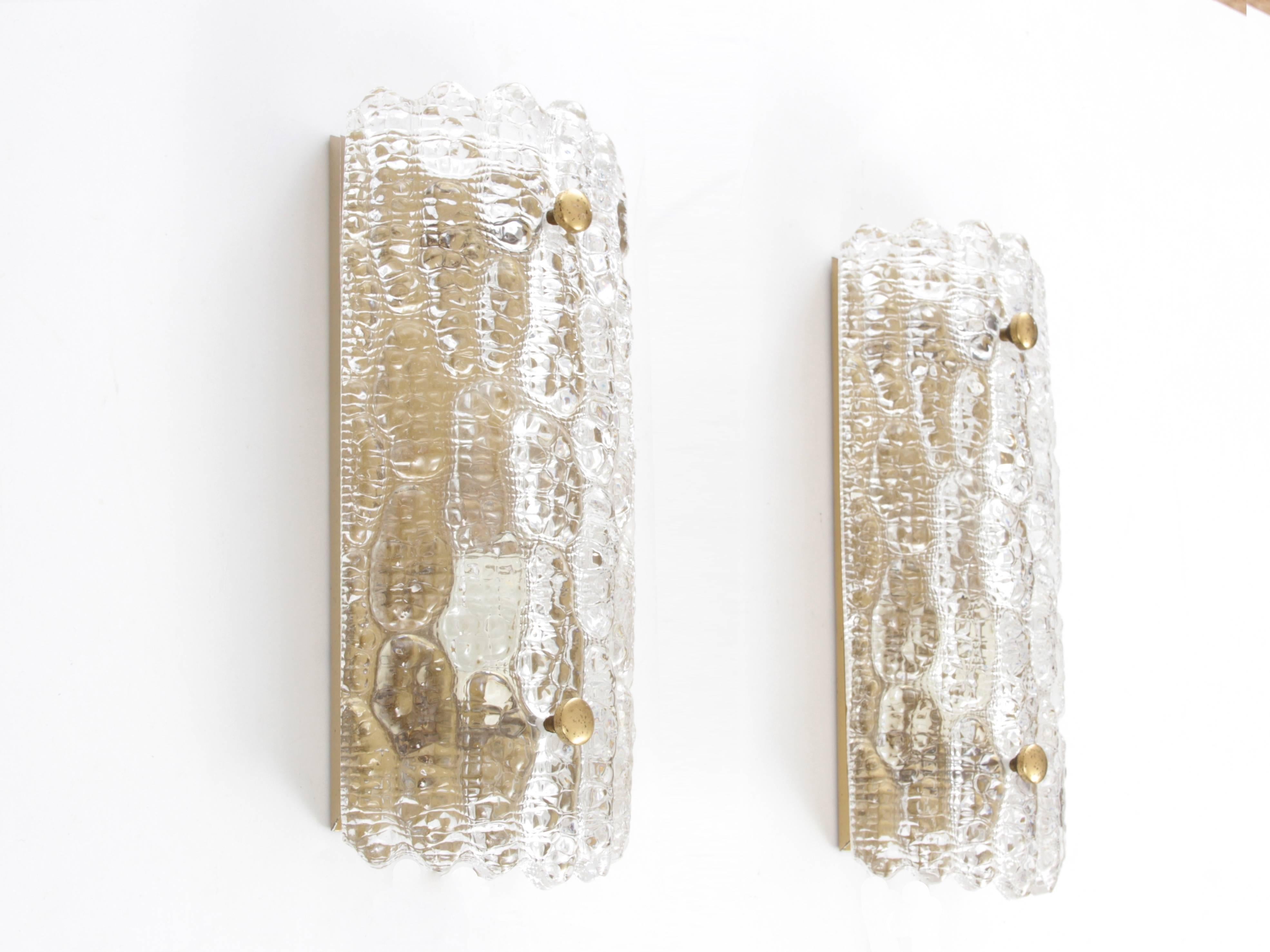 Mid-Century Modern pair of wall lamps design by Carl Fagerlund.