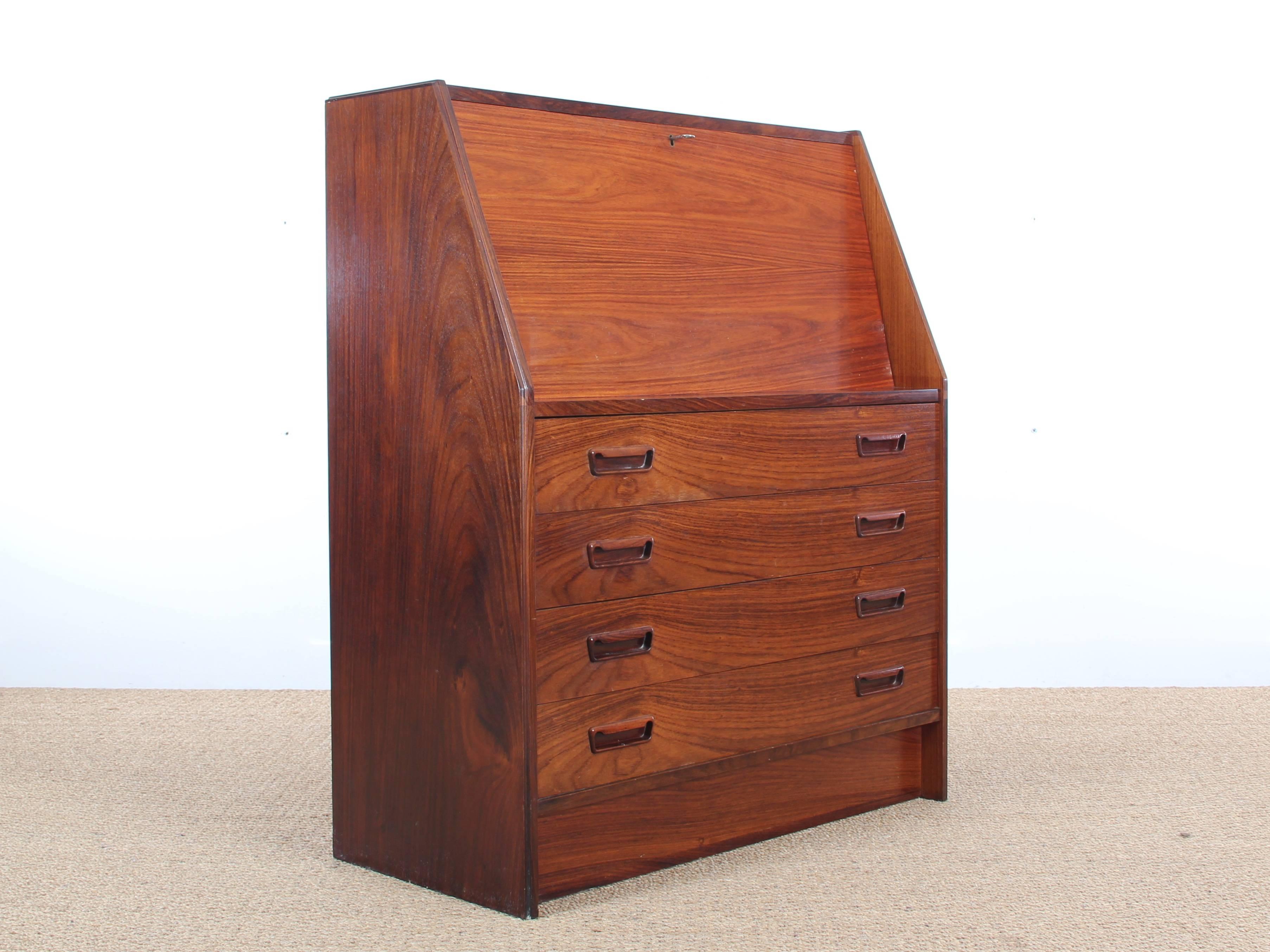 Mid-Century Modern Danish secretary in rosewood by Dyrlund with four large drawers.
