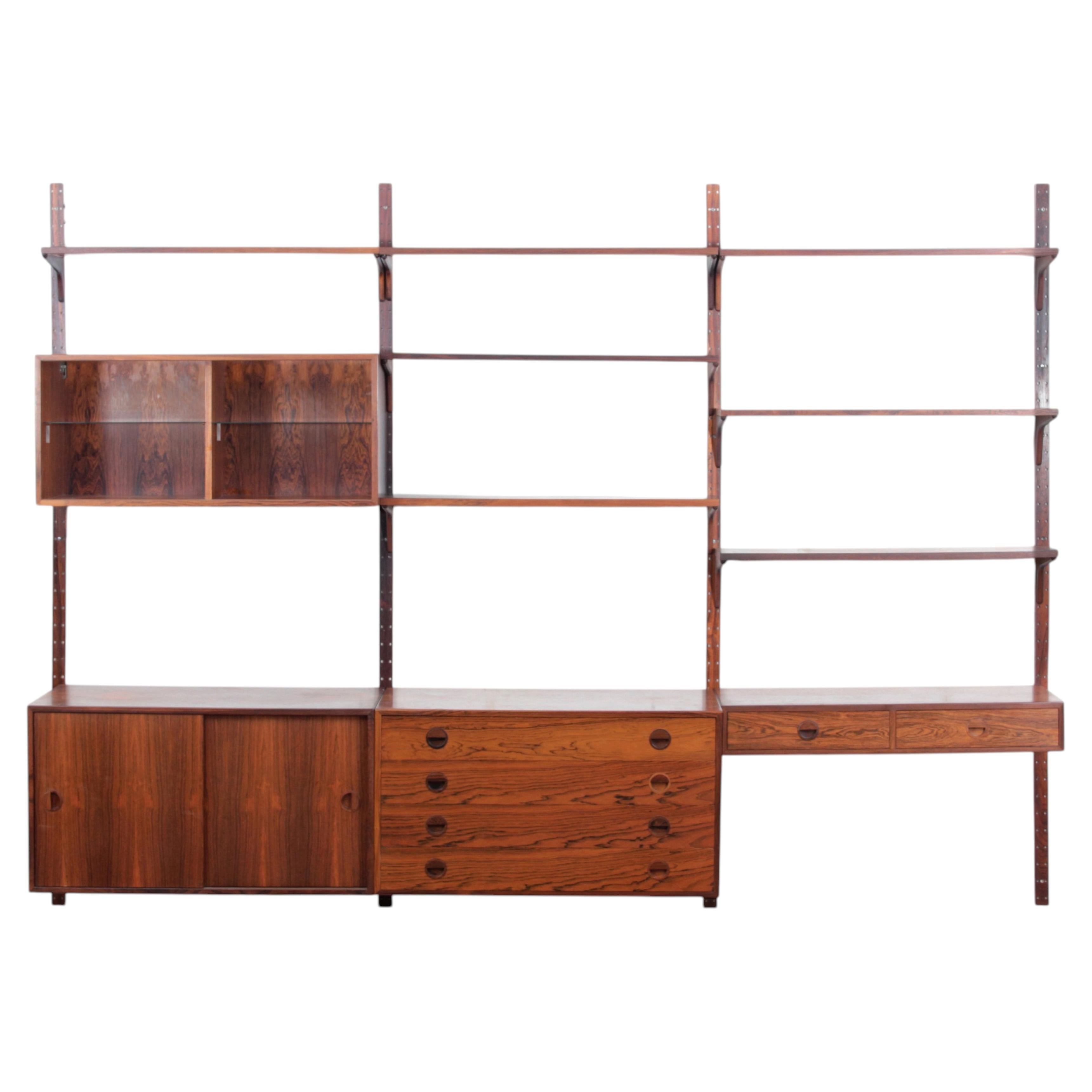Mid century modern scandinavian wall system in rosewood For Sale
