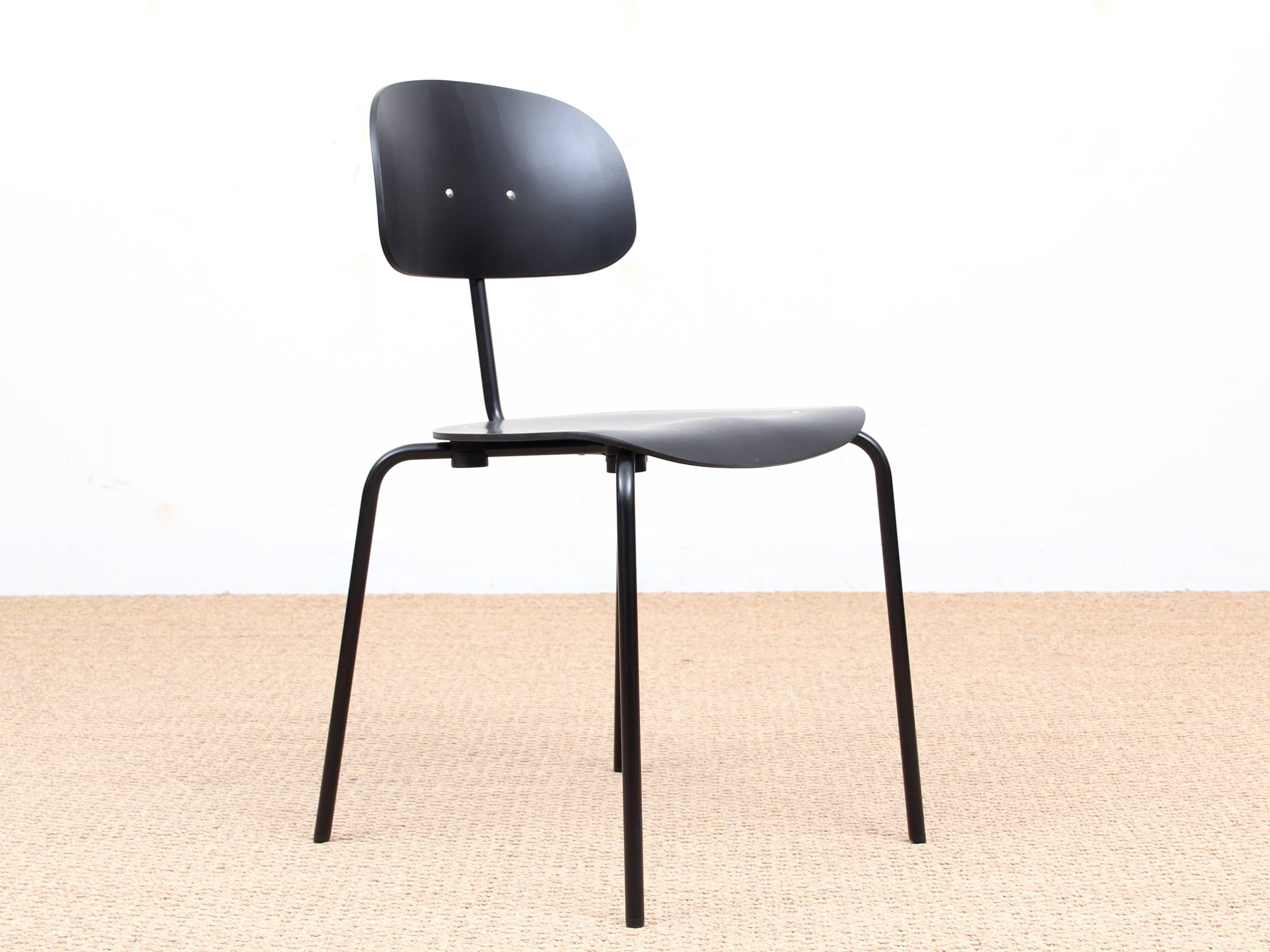 Mid-Century Modern chair model S 118. New release. Frame in black or chrome-plated steel tube, seat and back in natural or stained plywood beech.

Created in 1946 by the German designer Rudolph Kleinfopf, the S 118 is launched in Europe at the