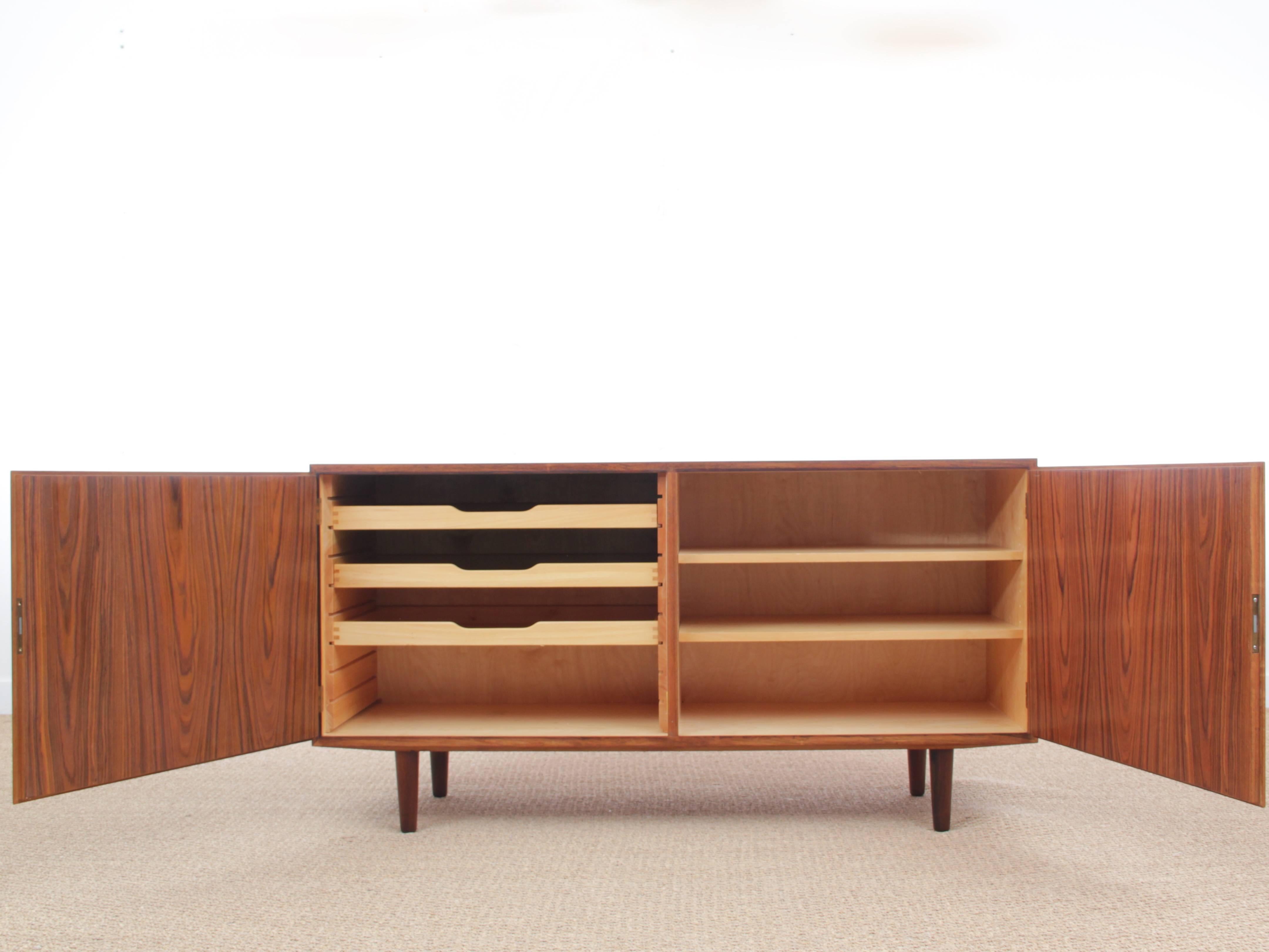 Mid-Century Modern Scandinavian little sideboard in rosewood by Poul Hundevad. Trace of restoration on right key hole.