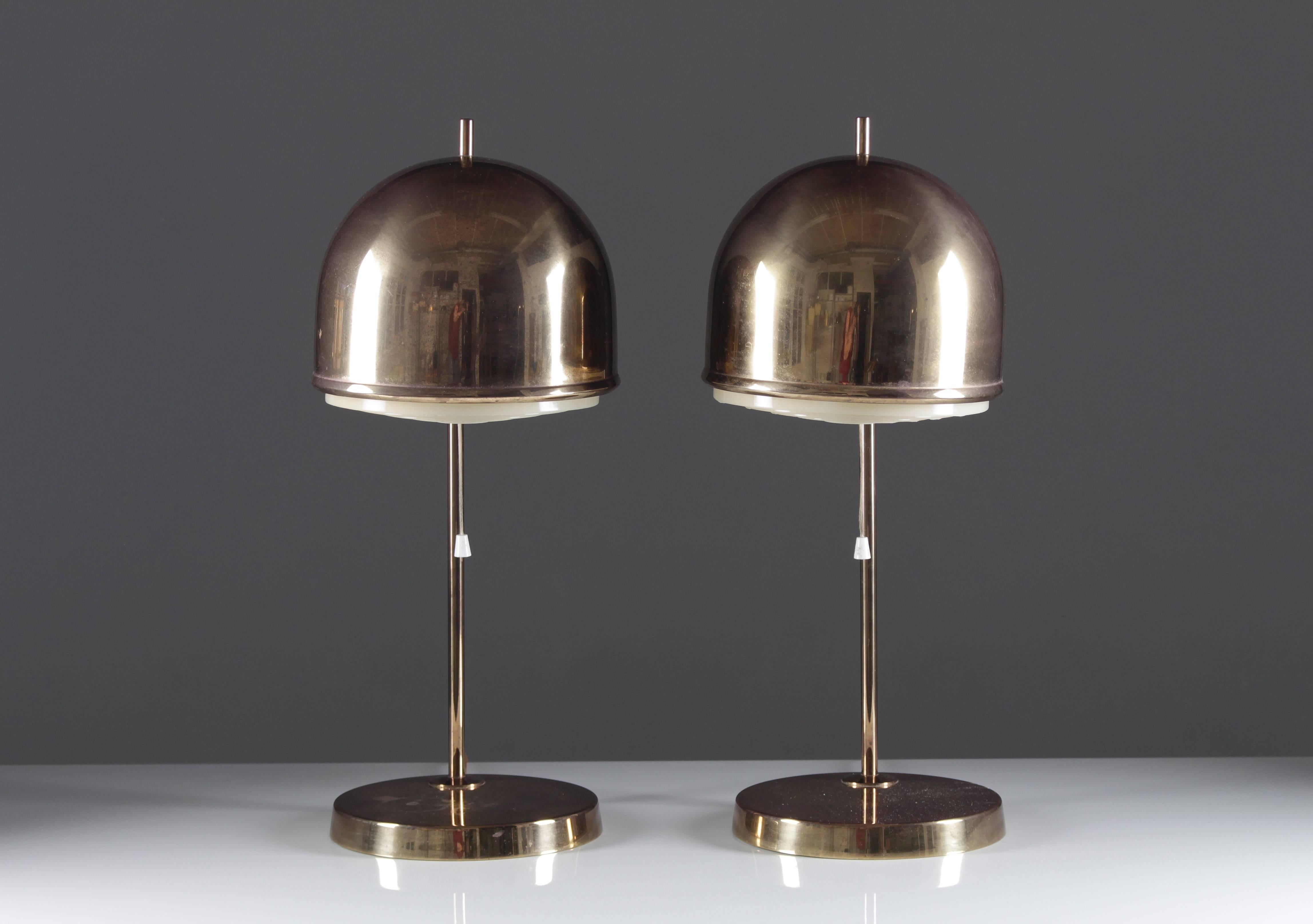 High-quality table lamps with diffusers and a perfect smooth patina on the brass. One small dent on one of the lamps as shown on picture.