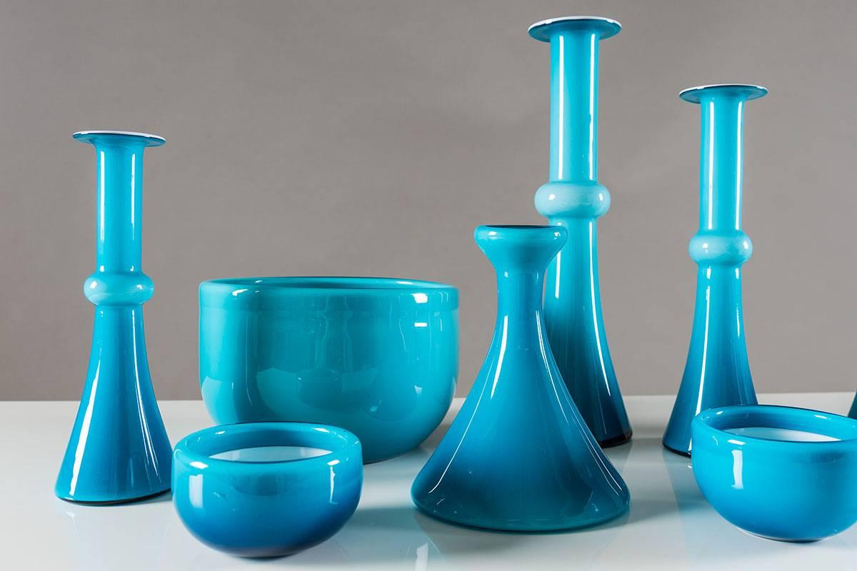 A collection of carefully chosen glass vases and bowls by Per Lutken for Holmegaard, Denmark. The collection consists of six vases up to 32 cm and four bowls.
Condition: Excellent.