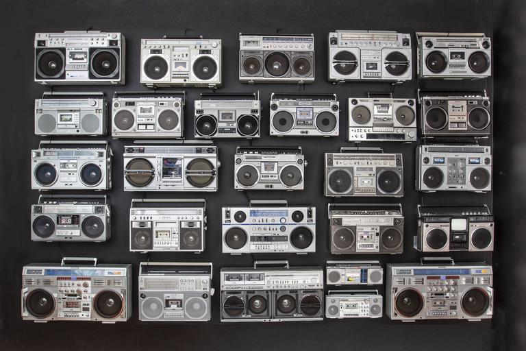 This is a chance to decorate your house, office (or music studio!) with something truly unique. A complete collection of 27 original boomboxes from the 1980s. This collection features some true holy grails, such as the Conion C-100f, the Sharp