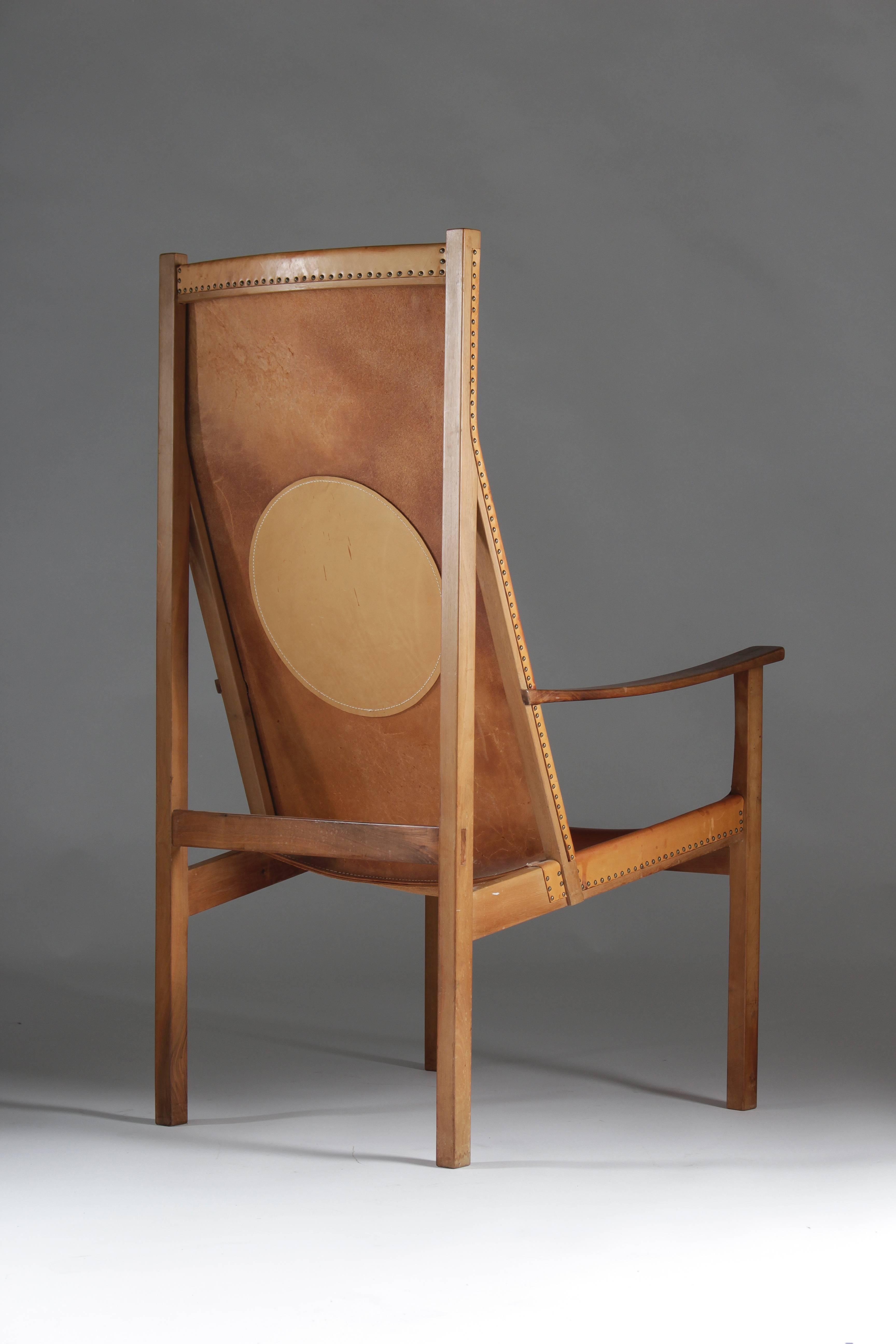 This chair is designed Swedish architect Egon Jonason, a Stockholm-based architect mostly known for the buildings he designed. According to his wife, however, he also created two-chair models during the 1960s, for which he hired craftsmen to