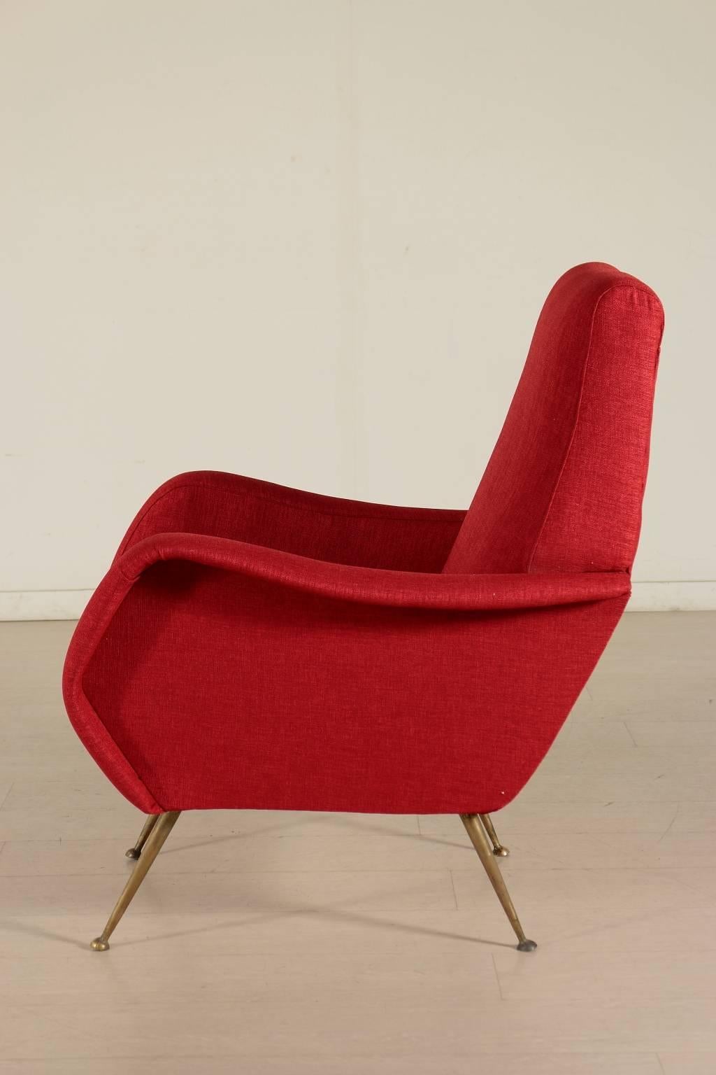 An armchair, foam padding, fabric upholstery, brass legs. Manufactured in Italy, 1950s.
