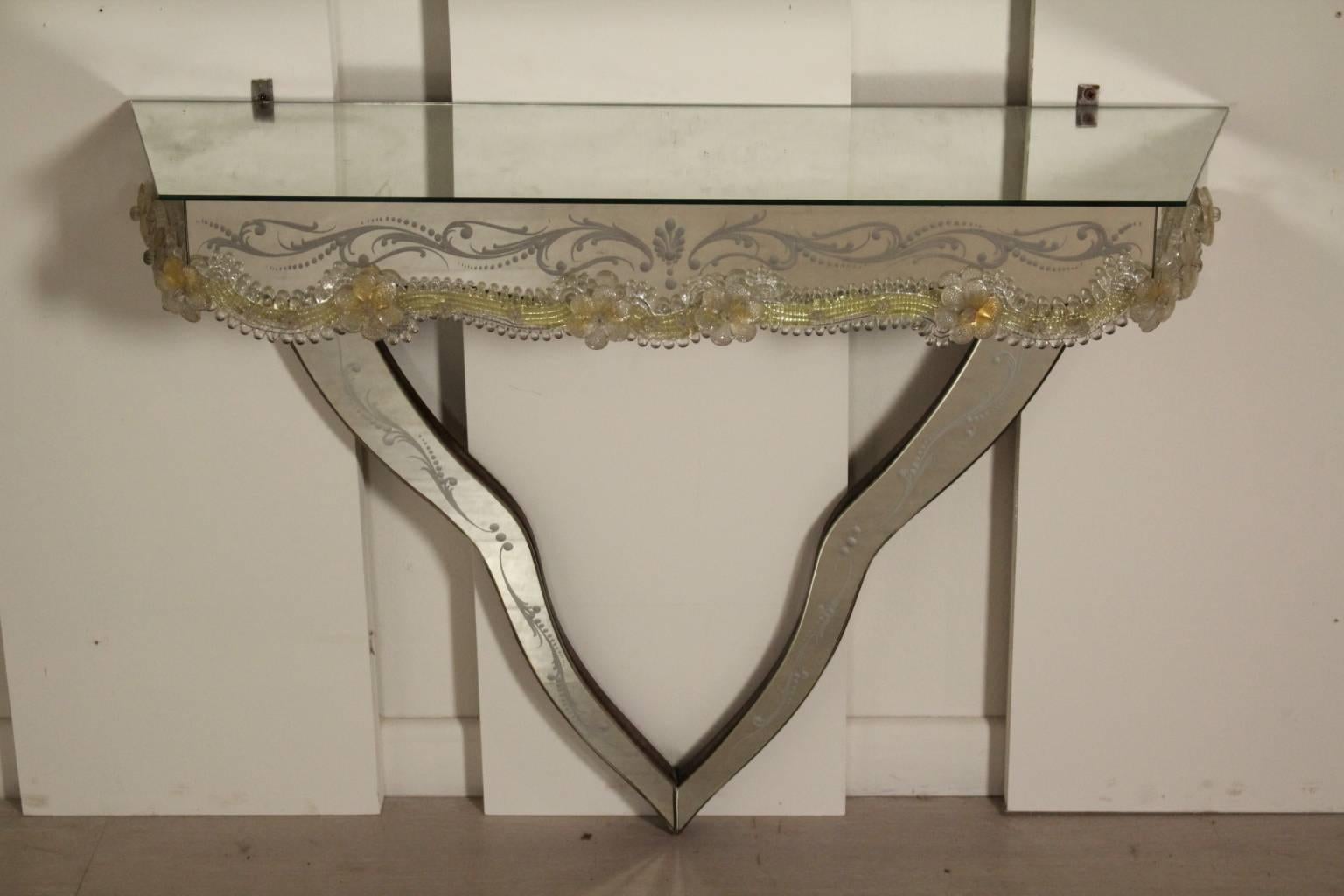 A console with mirror and a smaller mirror in the style of Brussotti. Decorated mirror and blown glass floral decorations. Manufactured in Italy, 1950s.