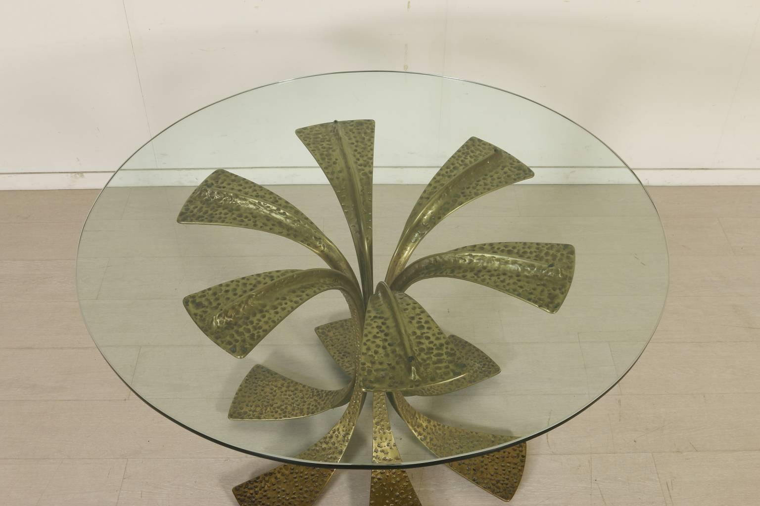 A table by Luciano Frigerio melted bronze basement and glass top. Manufactured in Italy, 1970s.