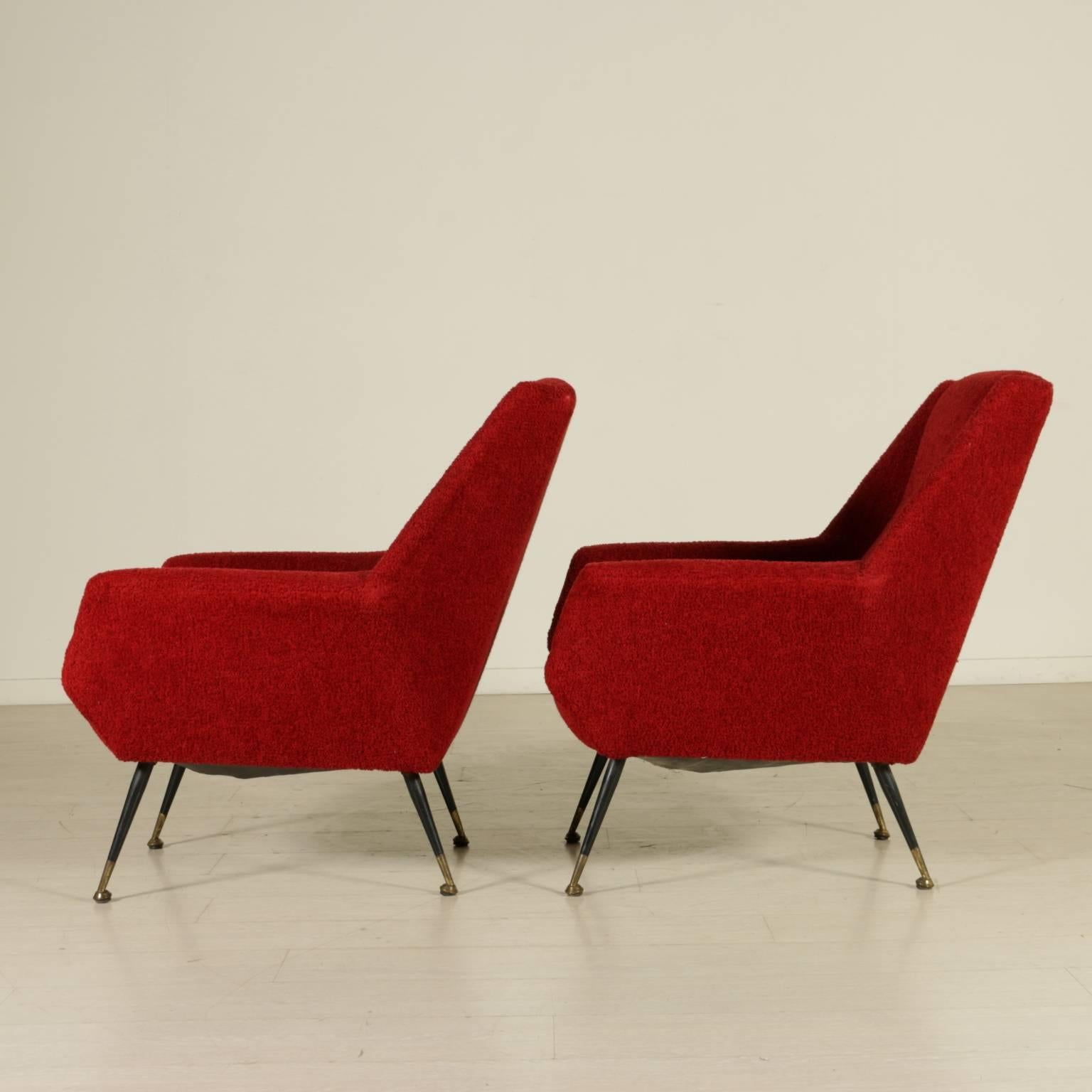 A pair of armchairs, foam padding, original fabric upholstery, metal legs with brass tips. Manufactured in Italy, 1950s-1960s.