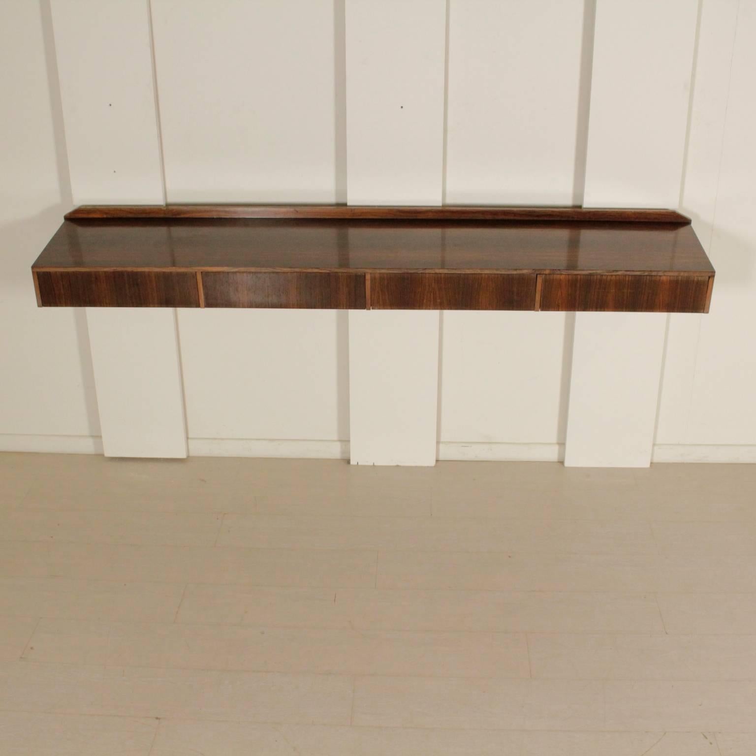 Wall-mounted console, rosewood veneer. Manufactured in Italy, 1960s.