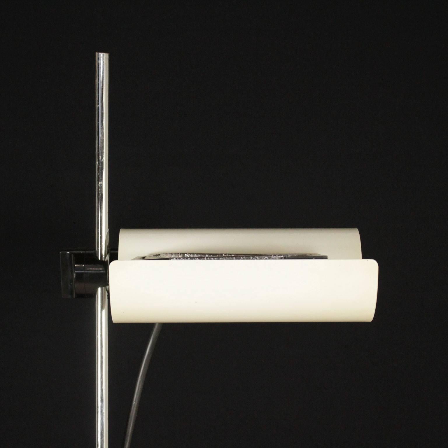 A floor lamp designed by Vico Magistretti for Oluce. Chromed metal, lacquered aluminum adjustable reflector. Manufactured in Italy, 1980s. Model: DIM 333.